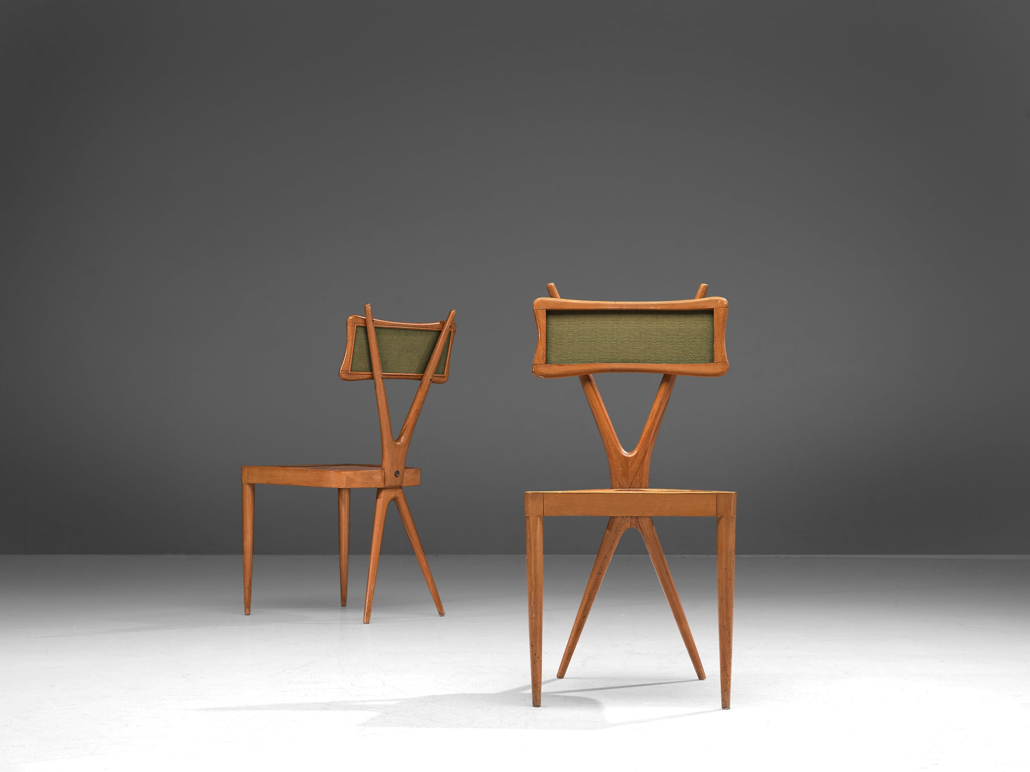 Gianni Vigorelli Set of Four Italian Dining Chairs with Crossed Backrests Seating Morentz