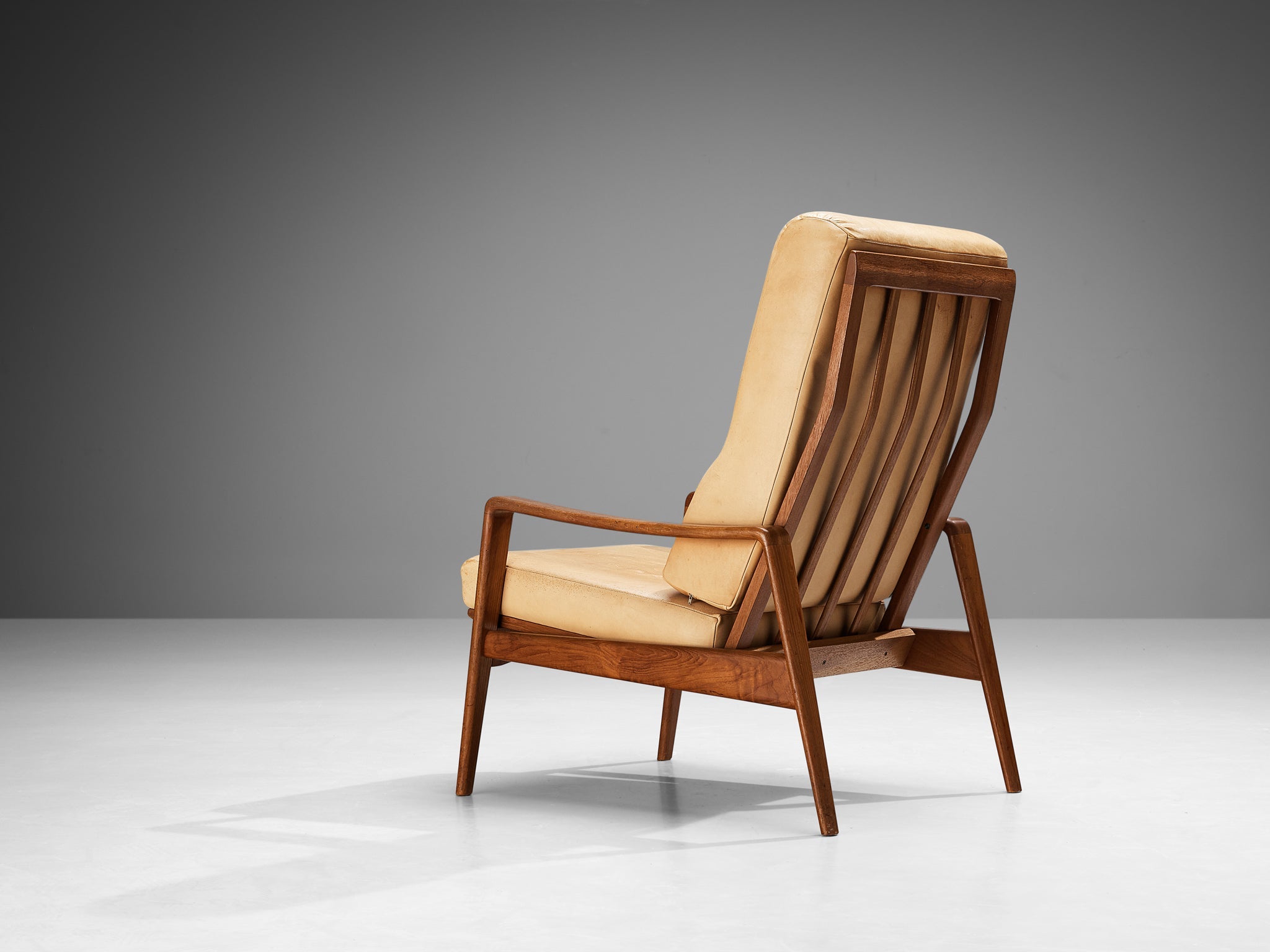 Arne Wahl Iversen Armchair with Ottoman in Teak and Camel Leather seating Morentz