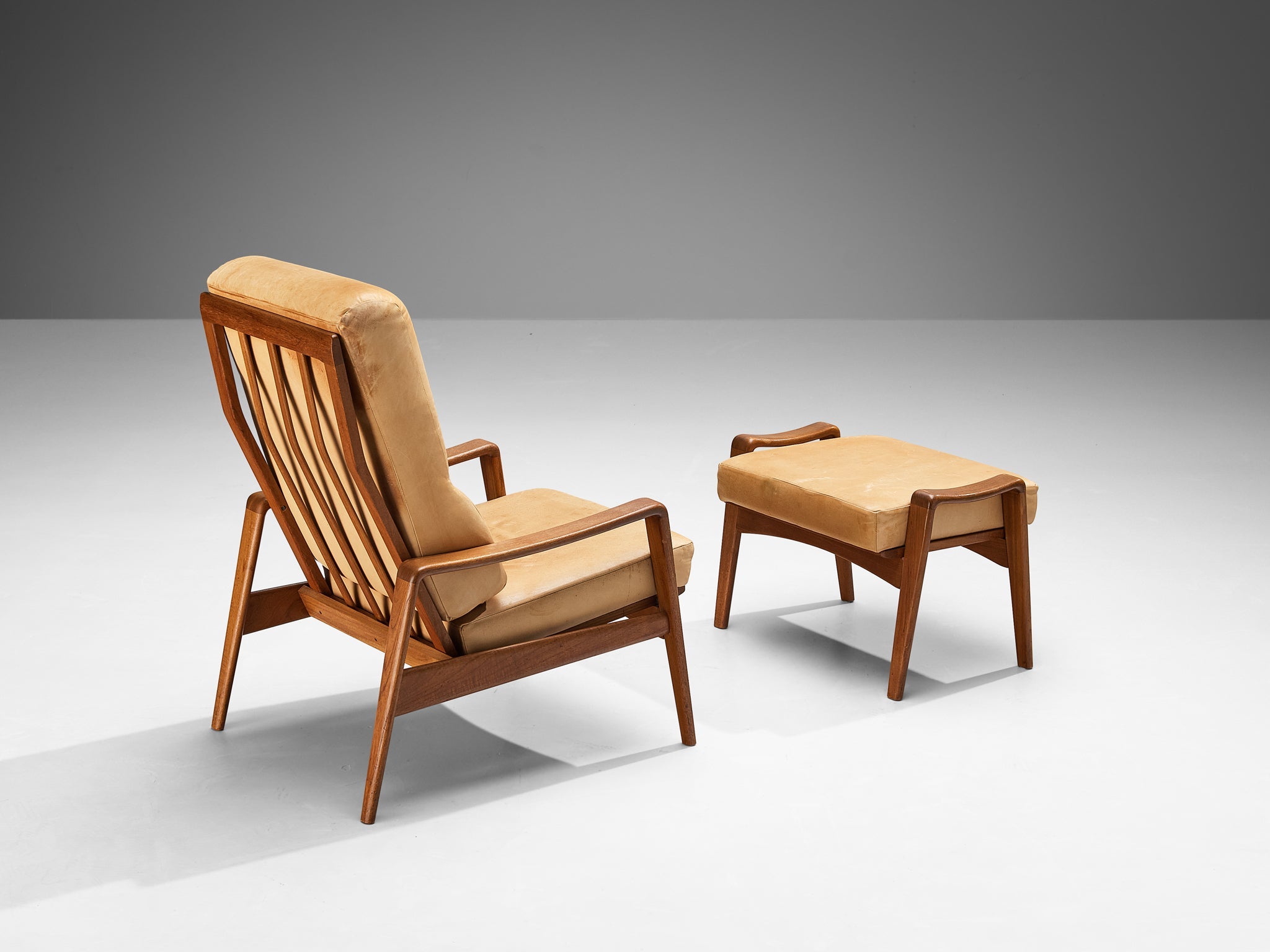 Arne Wahl Iversen Armchair with Ottoman in Teak and Camel Leather seating Morentz