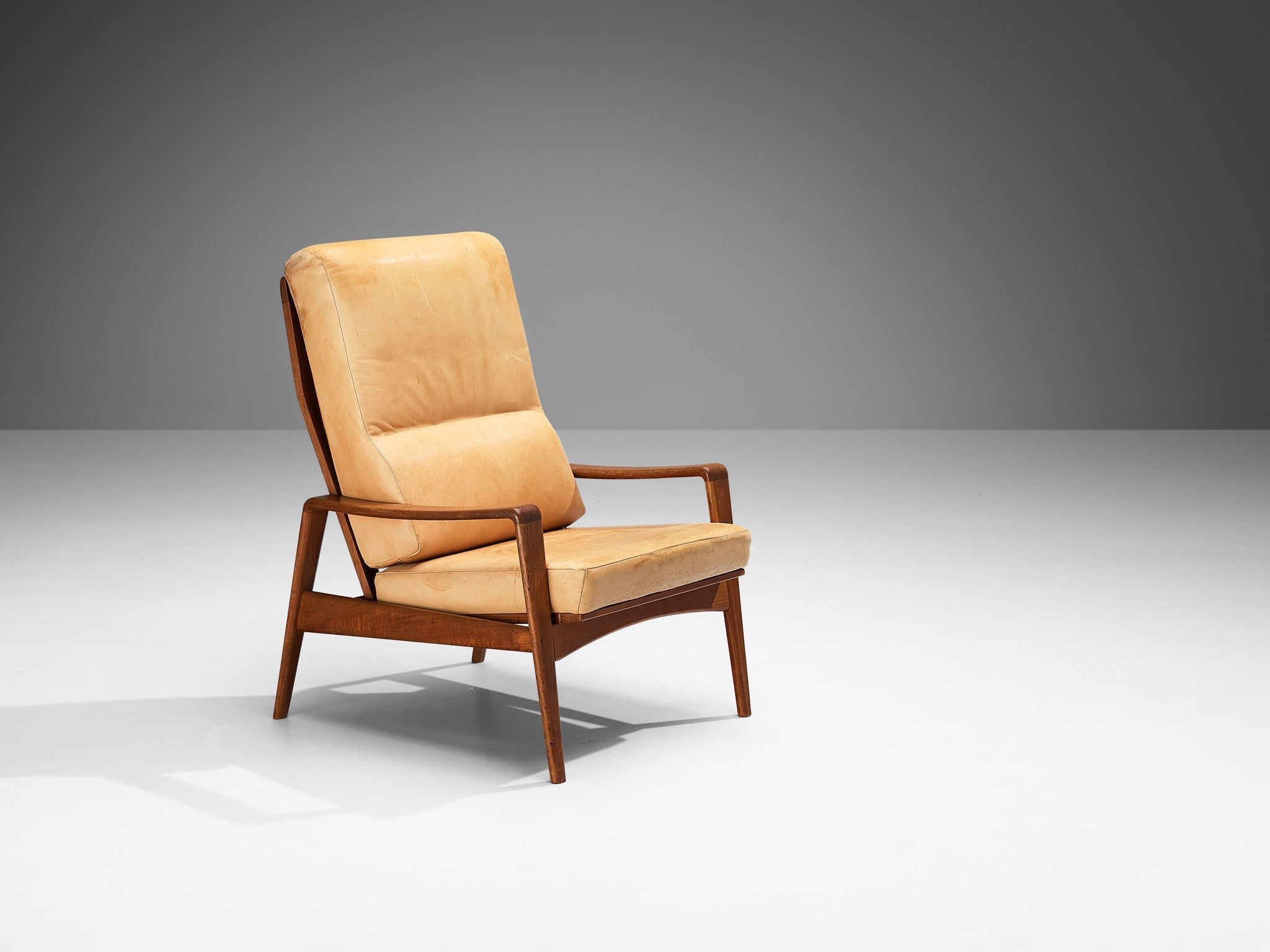 Arne Wahl Iversen Armchair with Ottoman in Teak and Camel Leather seating Morentz