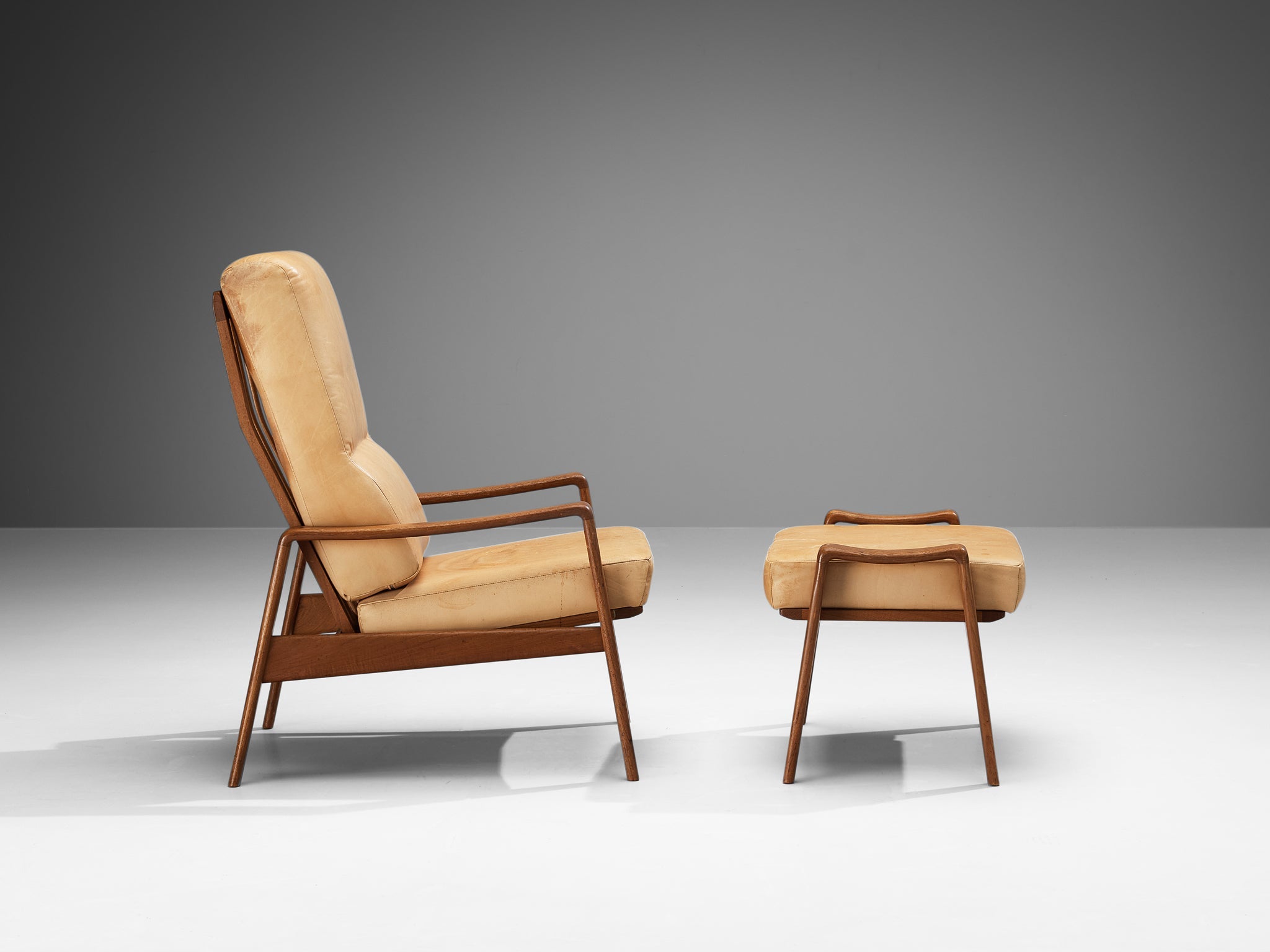 Arne Wahl Iversen Armchair with Ottoman in Teak and Camel Leather seating Morentz