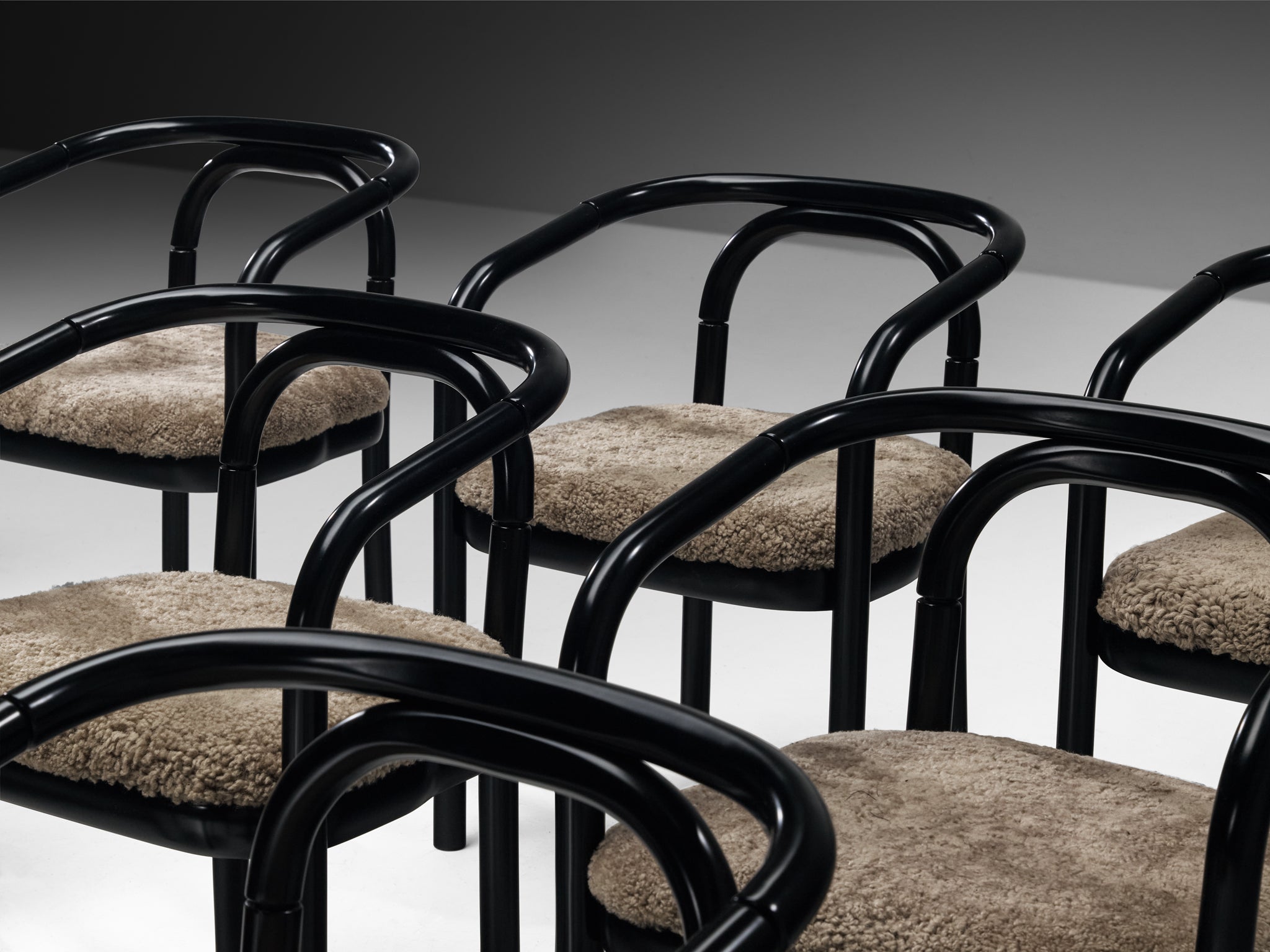 Sculptural Bentwood Armchairs in Black Lacquered Wood and Sheepskin