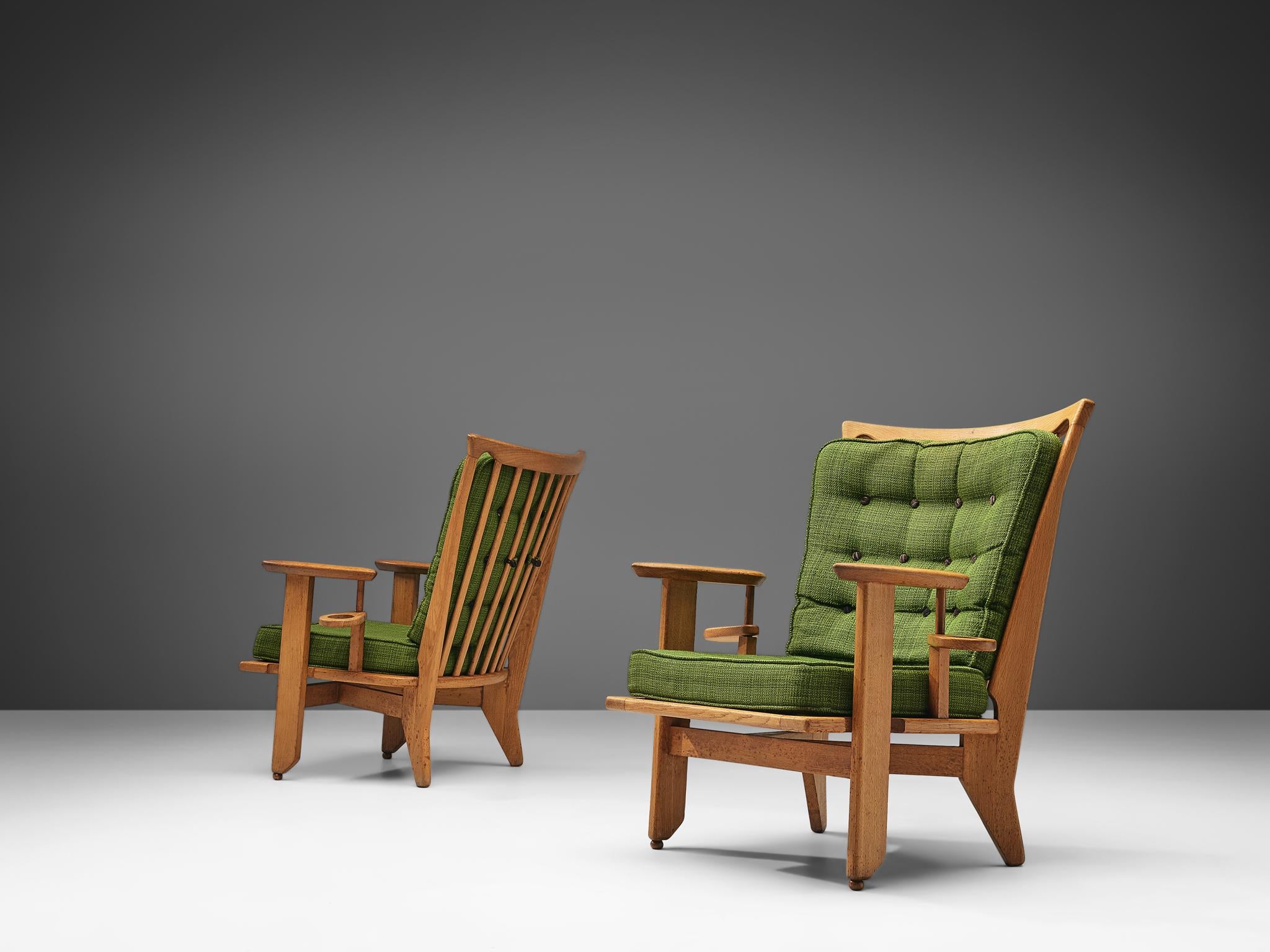 Guillerme & Chambron Pair of Lounge Chairs in Oak and Green Upholstery