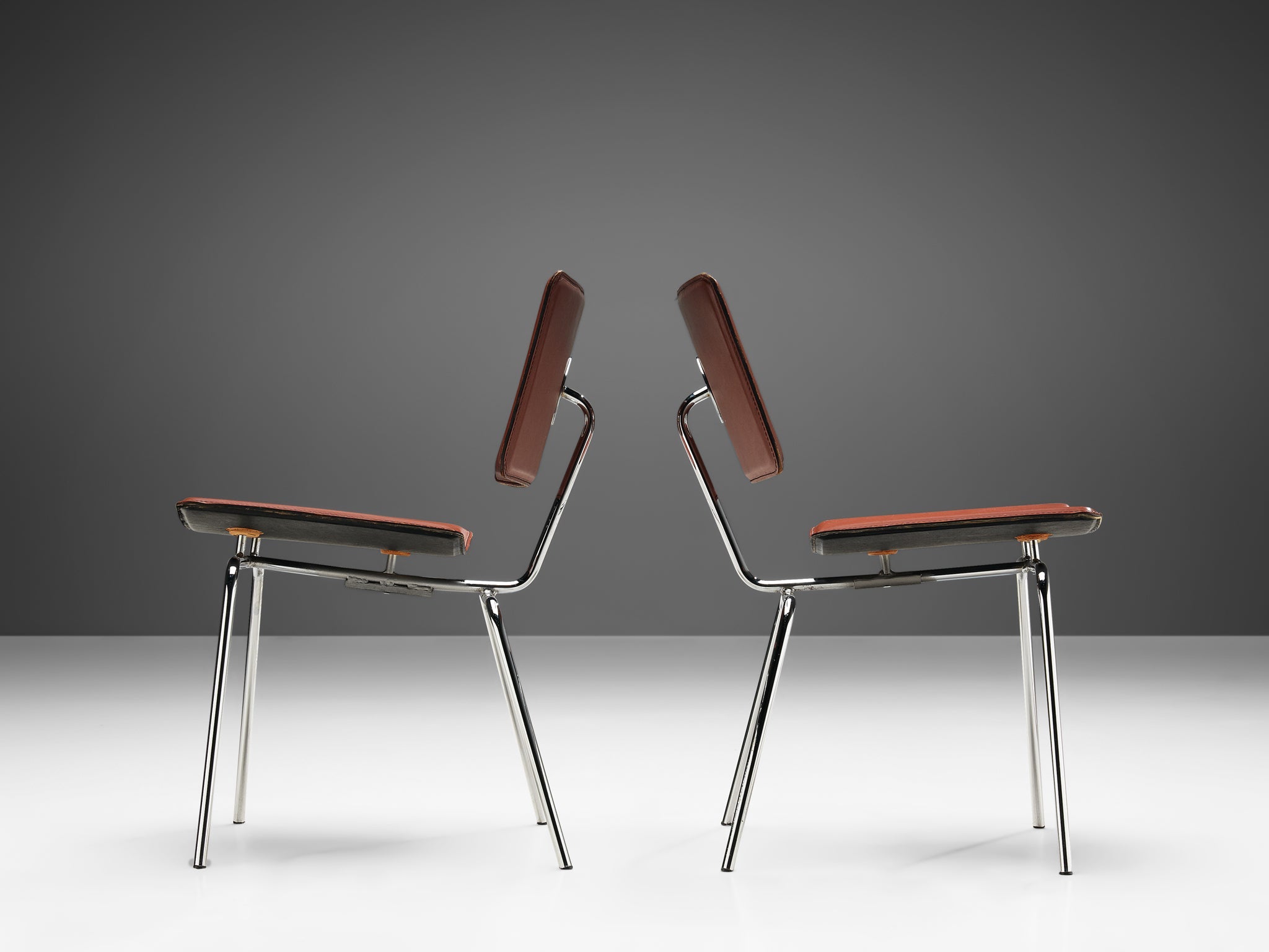 Pair of Side Chairs in Chrome and Leather seating Morentz