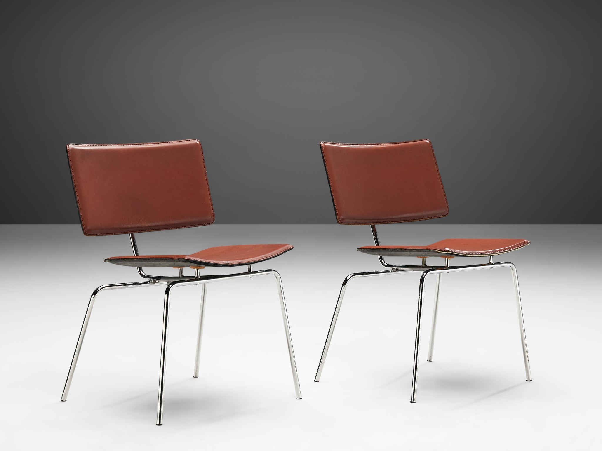 Pair of Side Chairs in Chrome and Leather seating Morentz