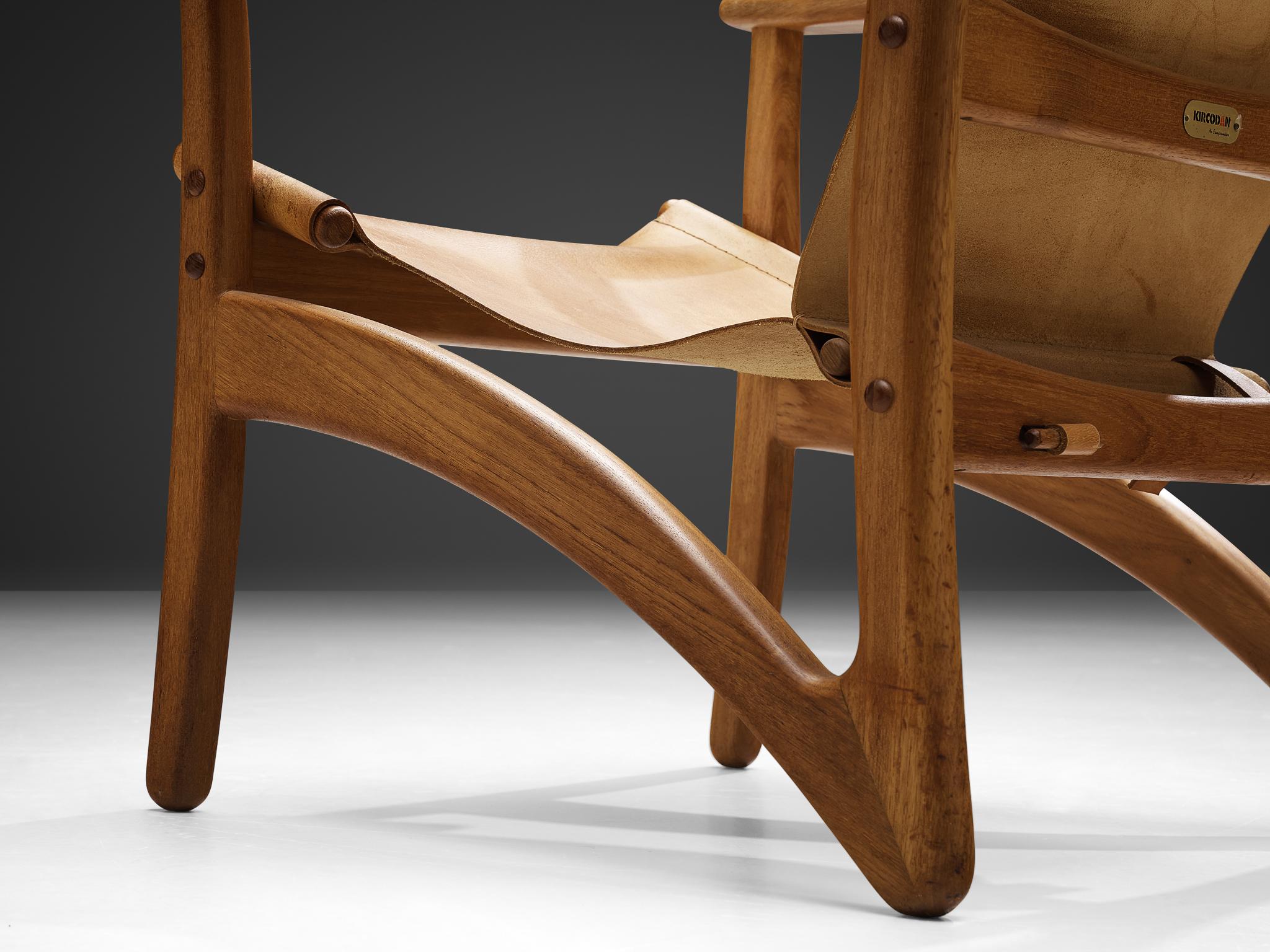 Danish Mid-Century Modern Lounge Chair in Teak and Cognac Leather seating Morentz