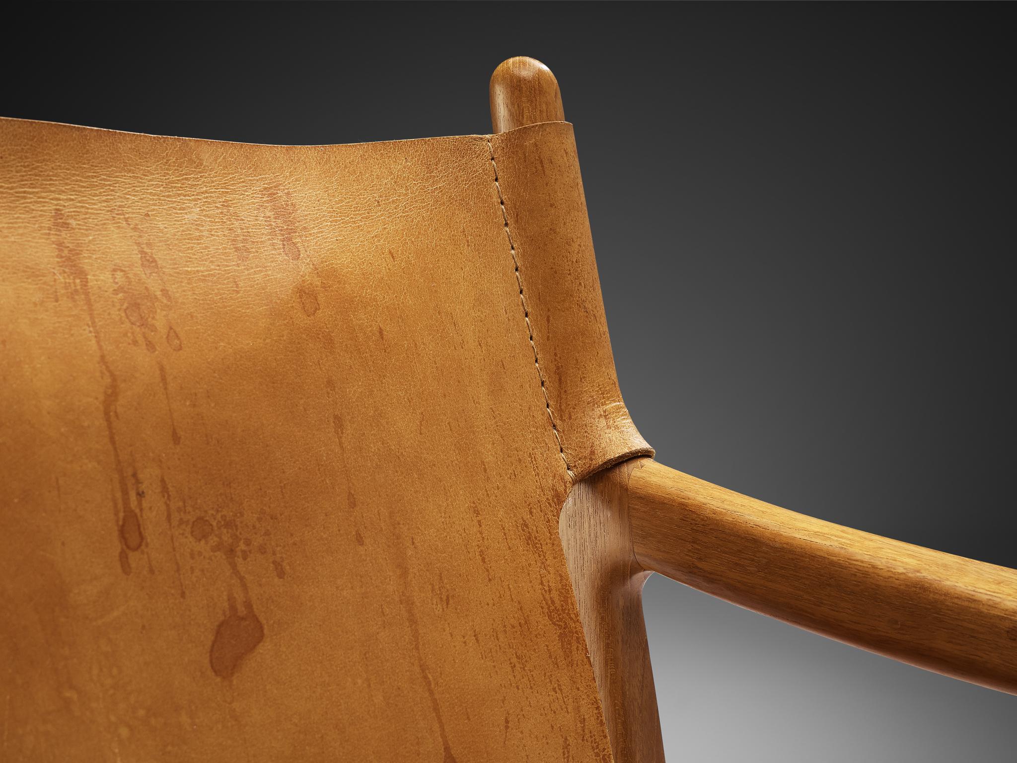 Danish Mid-Century Modern Lounge Chair in Teak and Cognac Leather seating Morentz