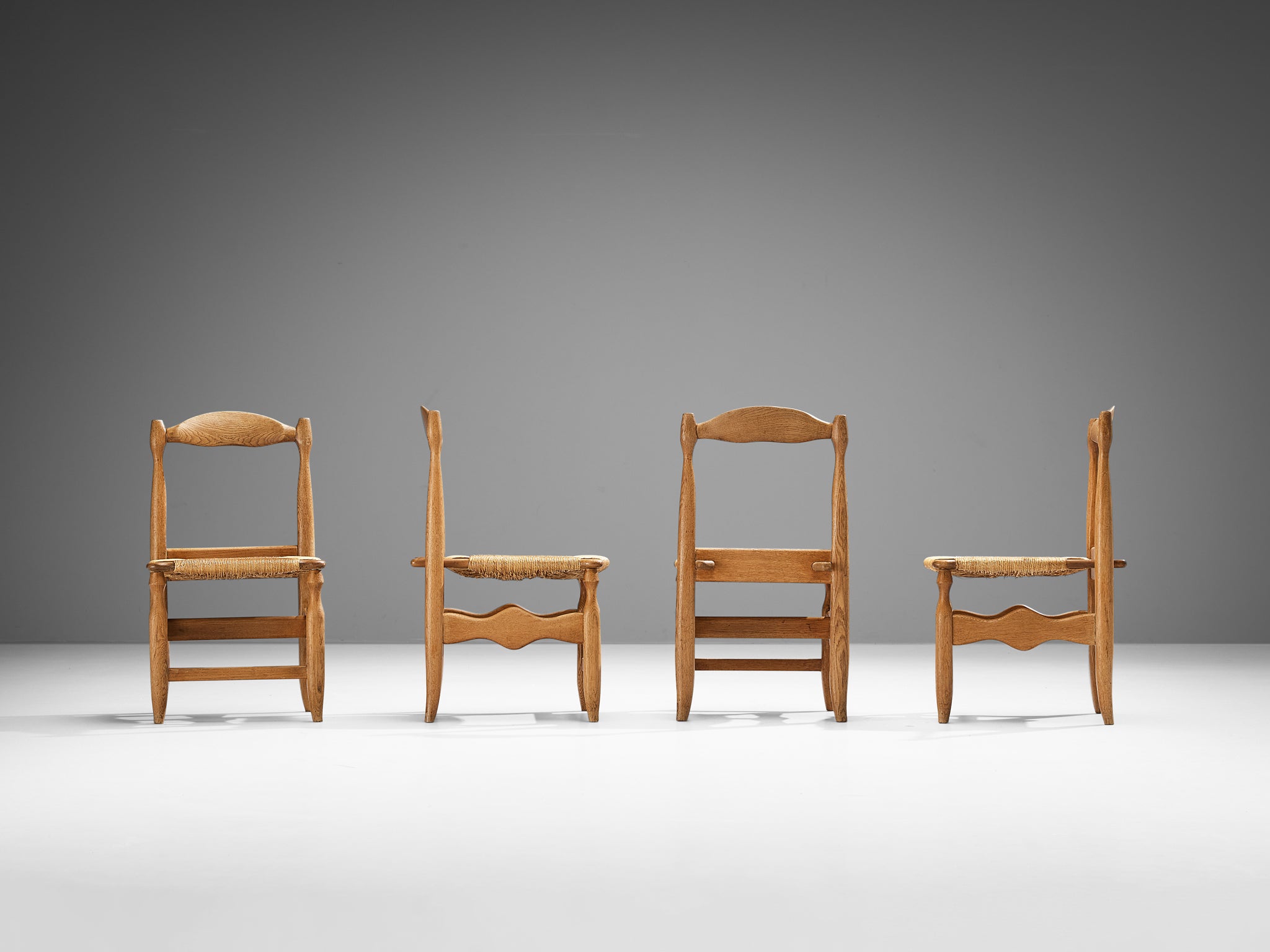 Guillerme & Chambron Set of Four 'Charlotte' Dining Chairs in Oak and Rush Seating Morentz