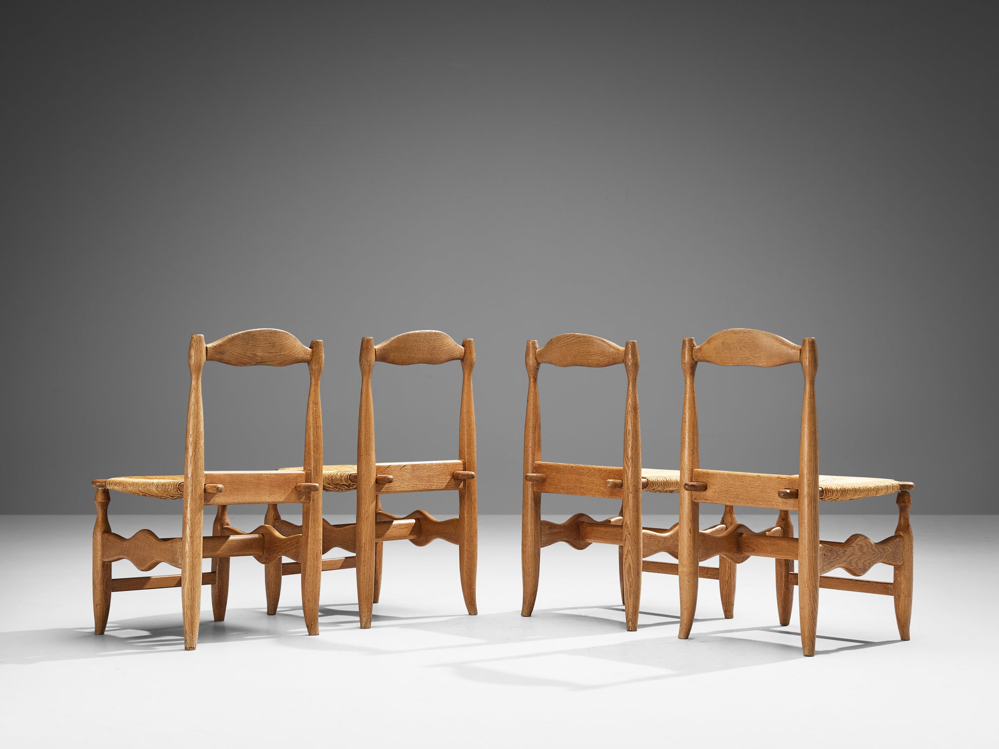 Guillerme & Chambron Set of Four 'Charlotte' Dining Chairs in Oak and Rush Seating Morentz