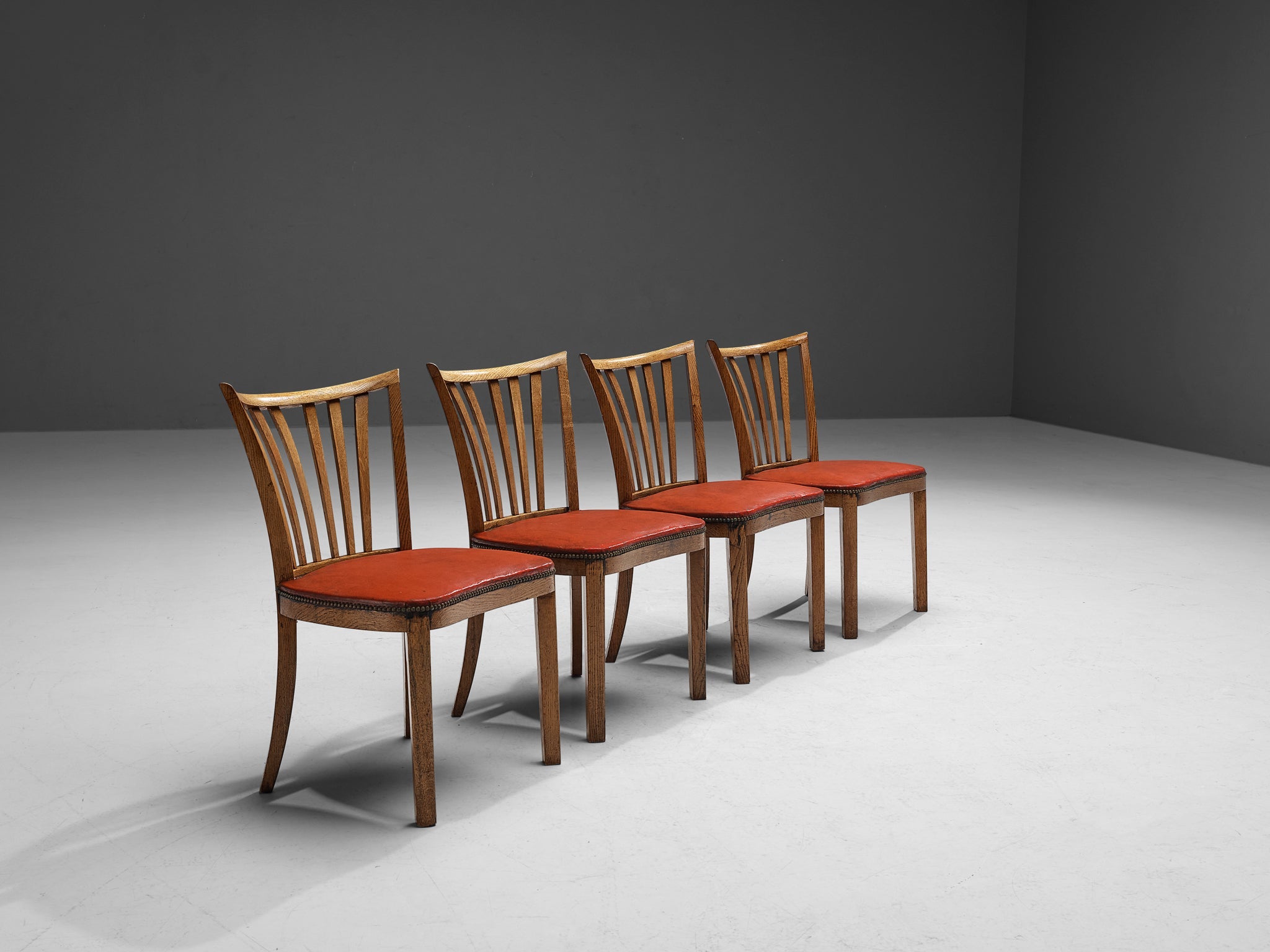 French Art Deco Set of Four Dining Chairs in Red Leatherette Oak Brass seating Morentz