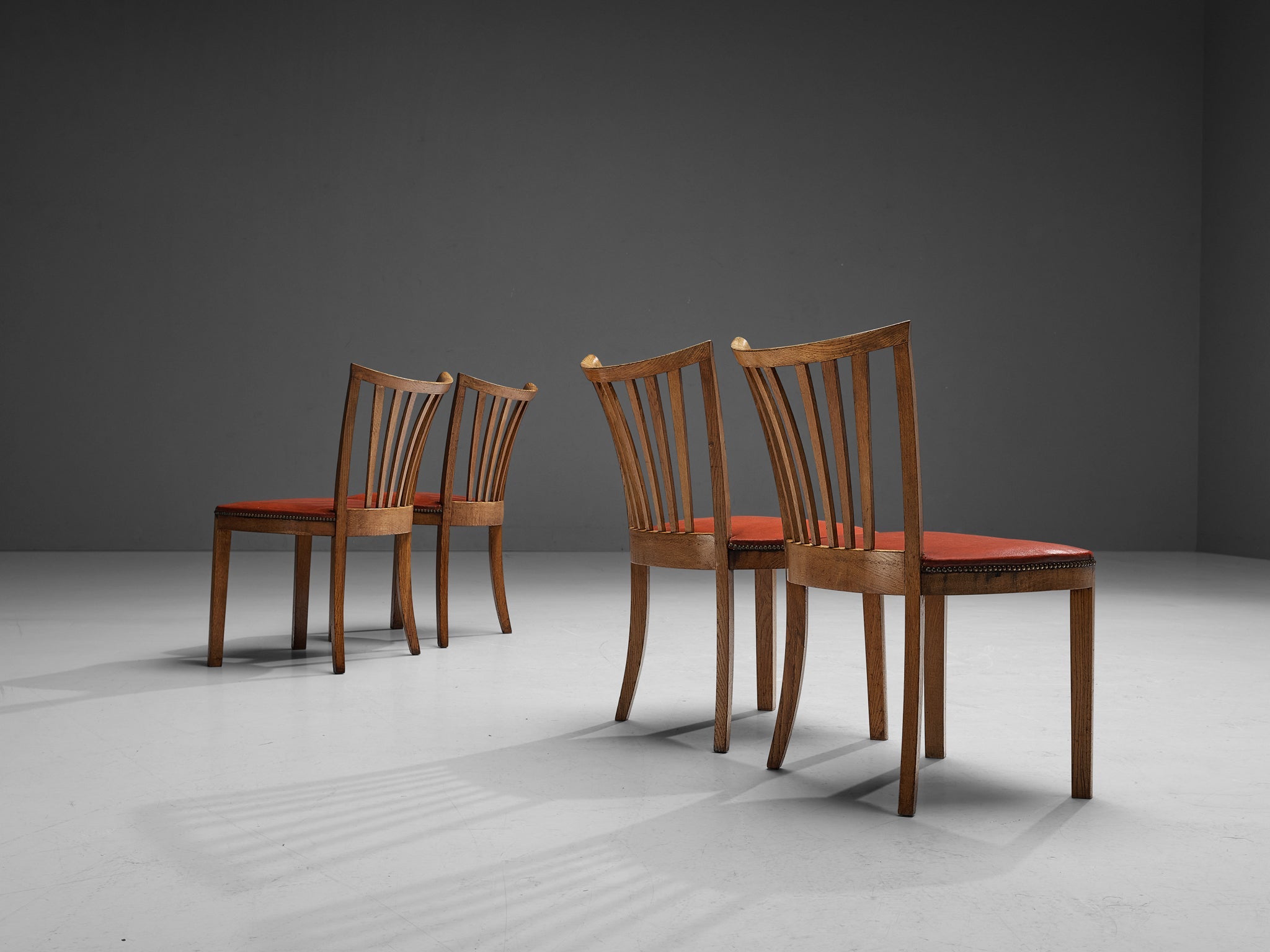 French Art Deco Set of Four Dining Chairs in Red Leatherette Oak Brass seating Morentz