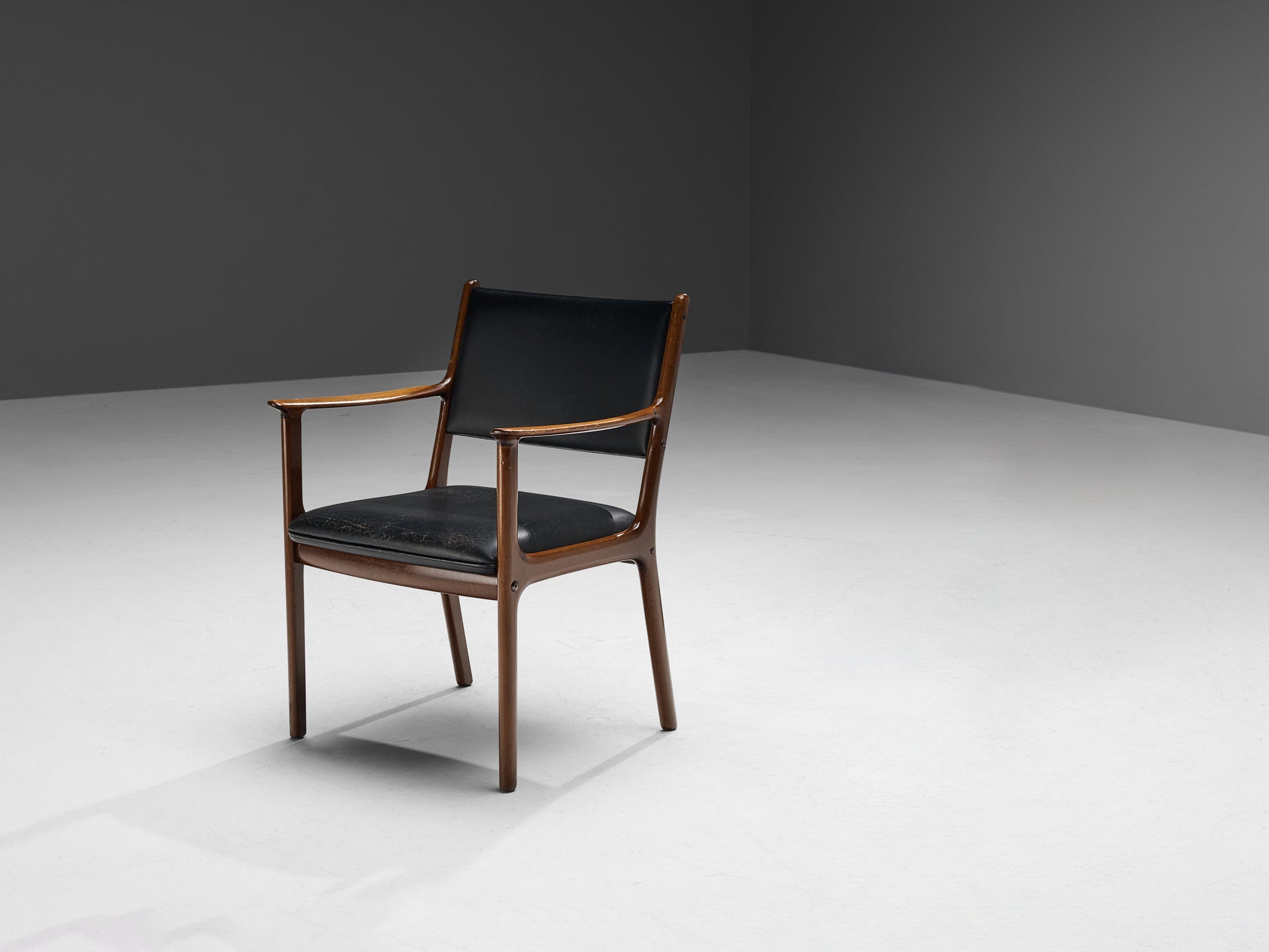 Ole Wanscher for Poul Jeppesen Armchair in Teak and Black Leather seating Morentz