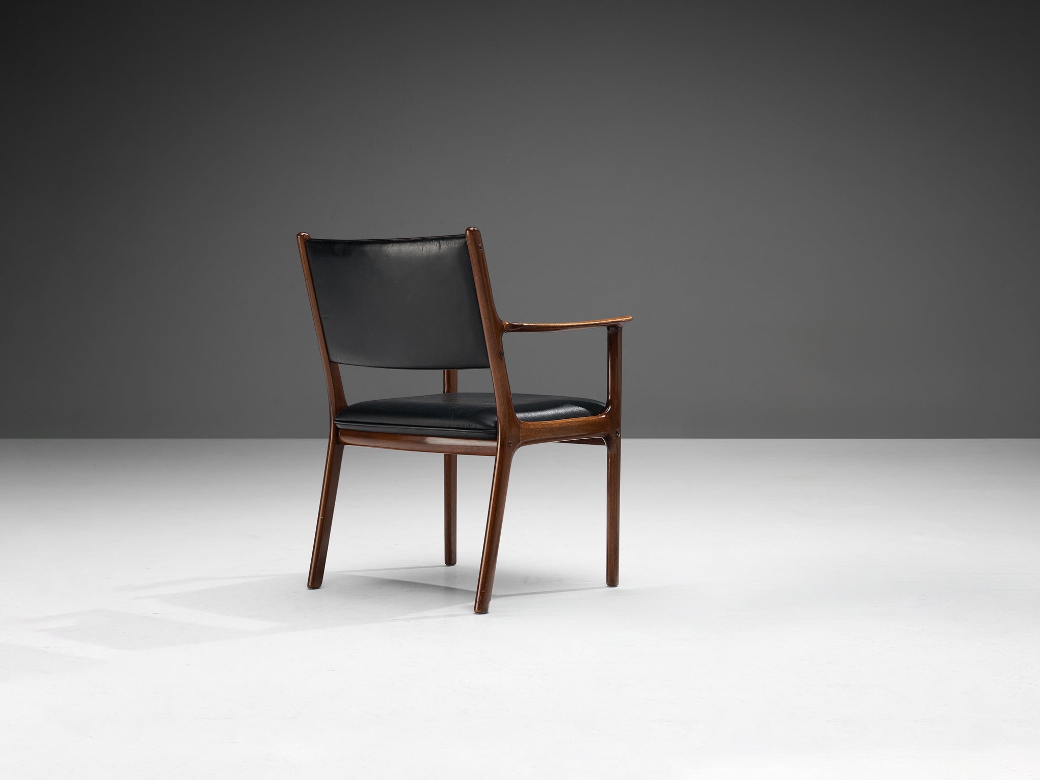 Ole Wanscher for Poul Jeppesen Armchair in Teak and Black Leather seating Morentz