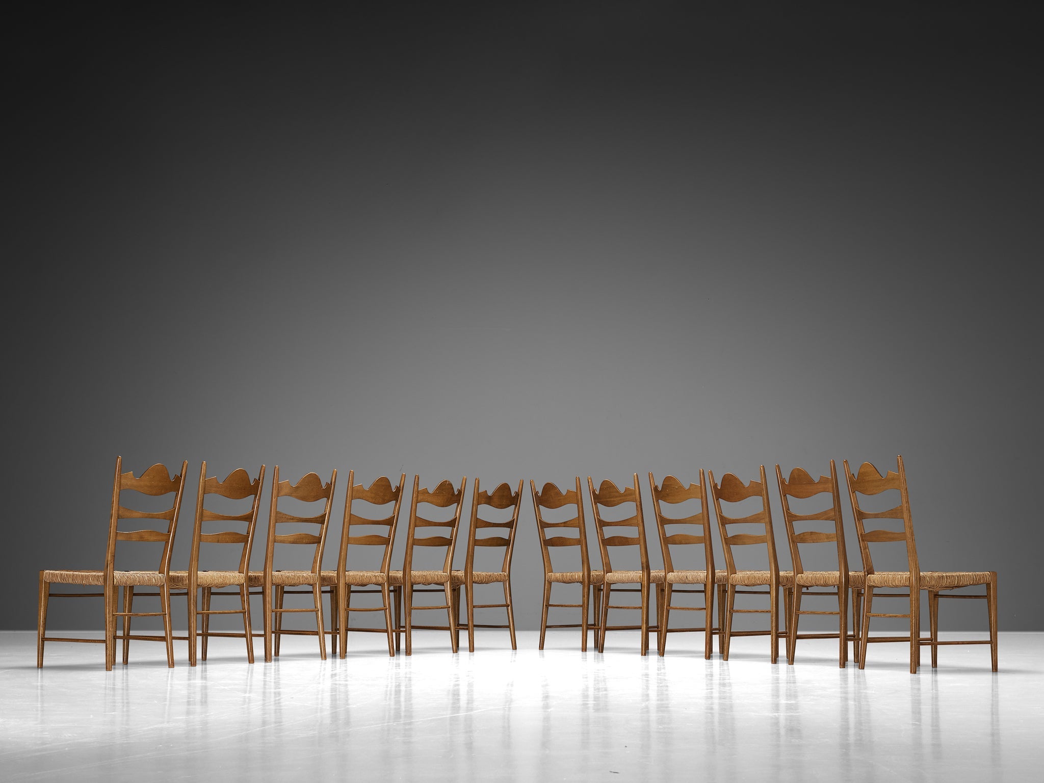 Set of Twelve Italian Dining Chairs with Carved Backs and Straw Seats seating Morentz