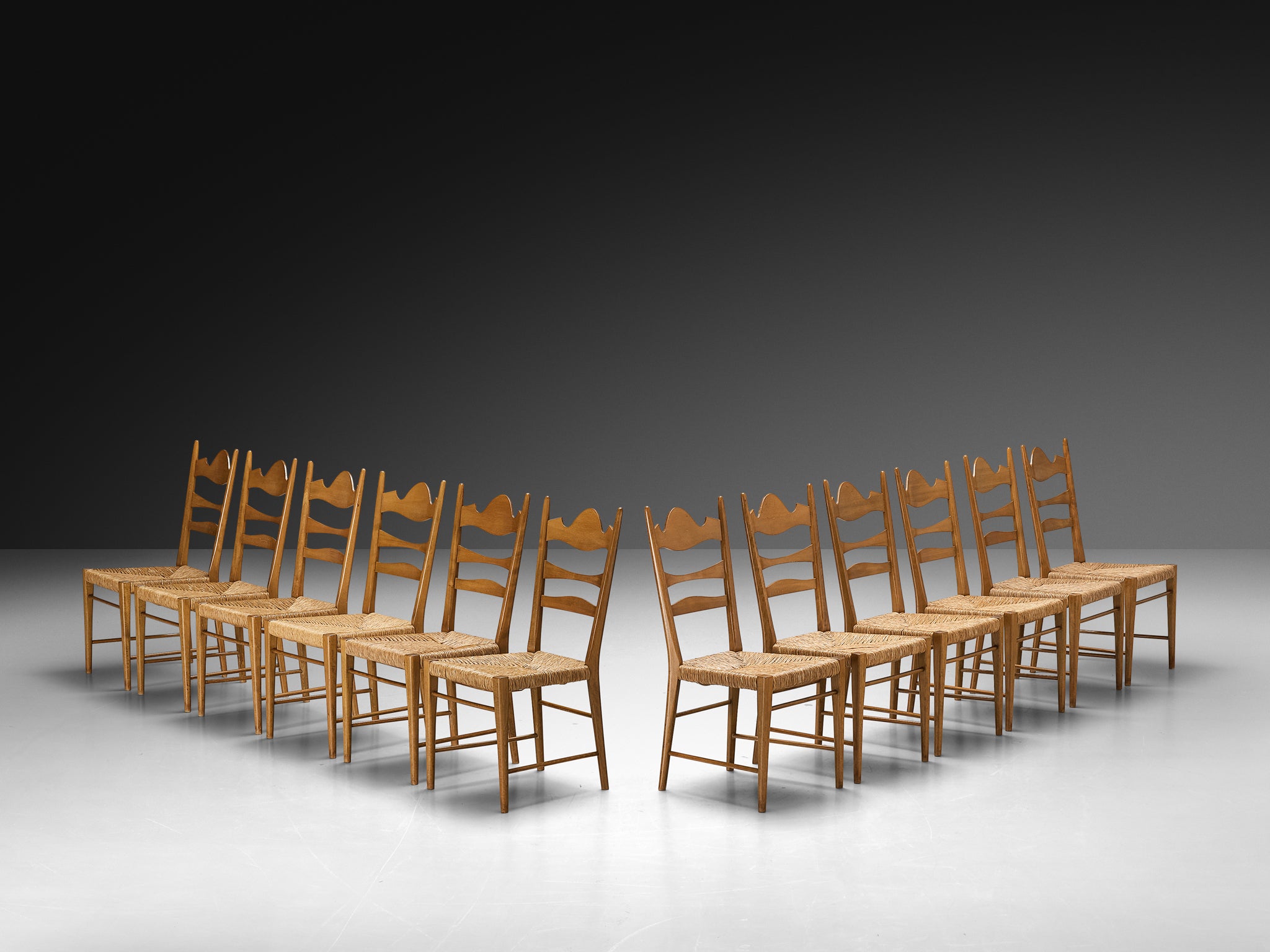 Set of Twelve Italian Dining Chairs with Carved Backs and Straw Seats