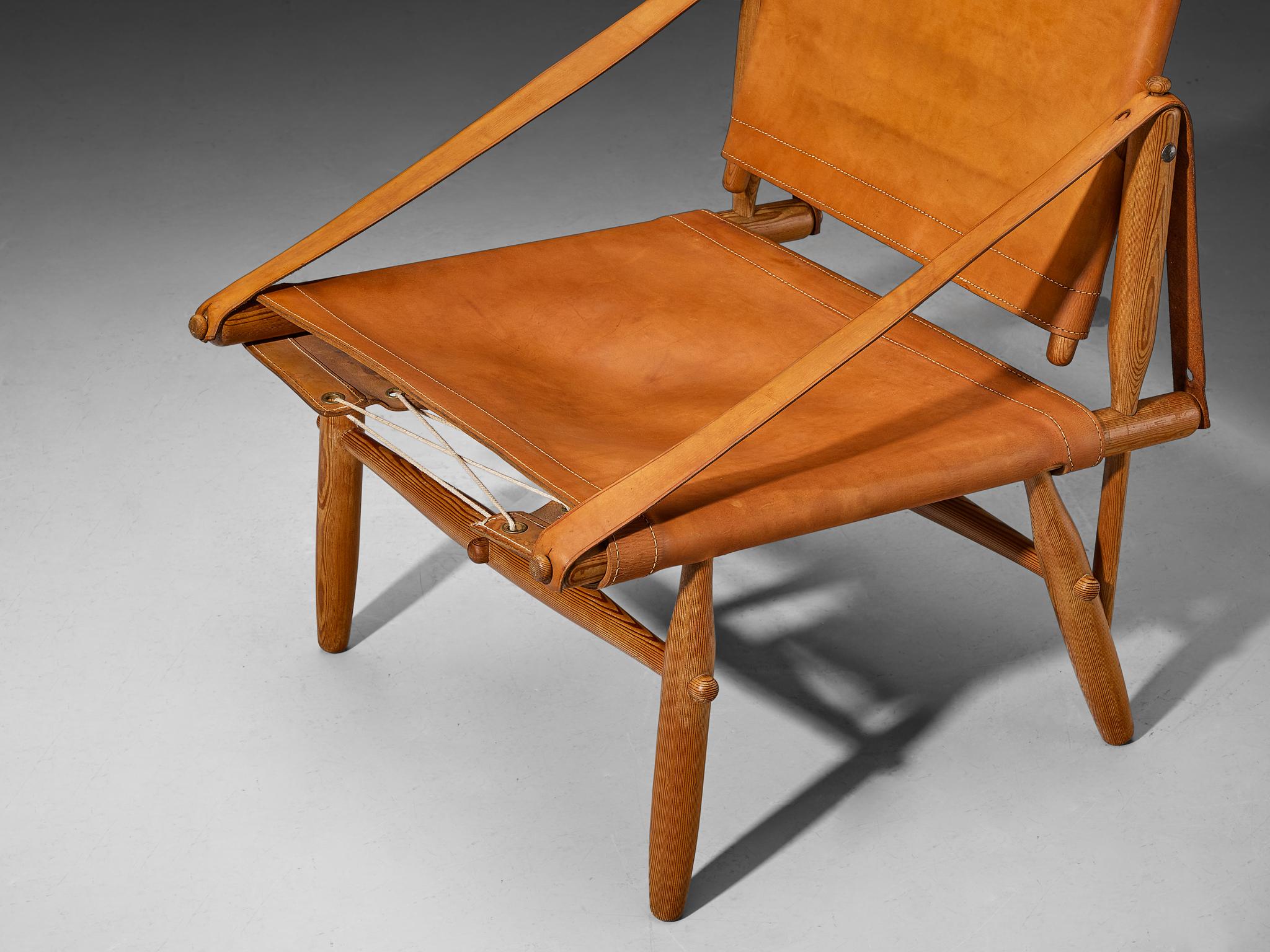 Rare Ilmari Tapiovaara for Lukkiseppo 'Chaco' Lounge Chairs Cognac Leather seating Morentz