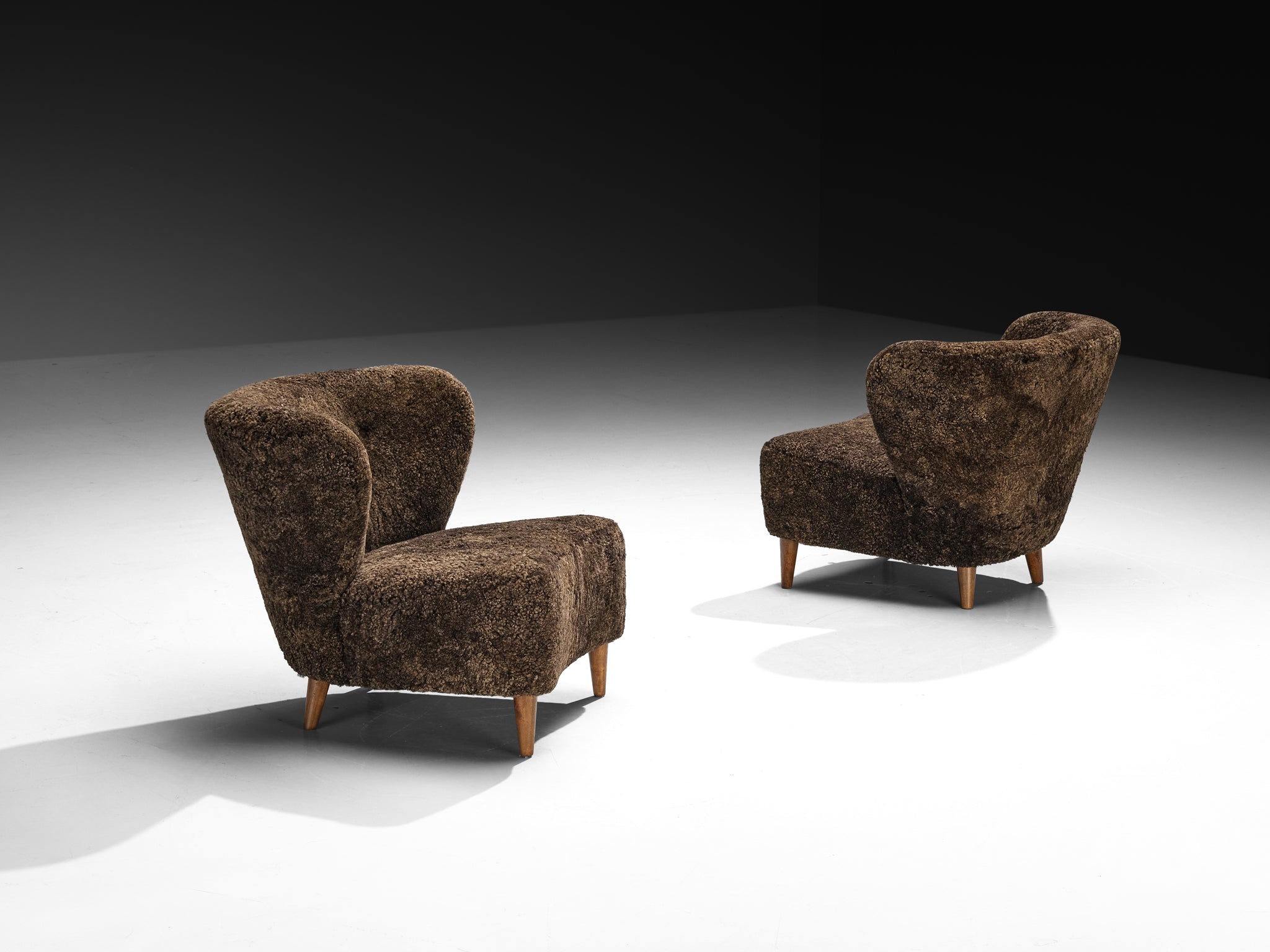 Gösta Jonsson Pair of Lounge Chairs in Dark Brown Sheepskin Seating Morentz