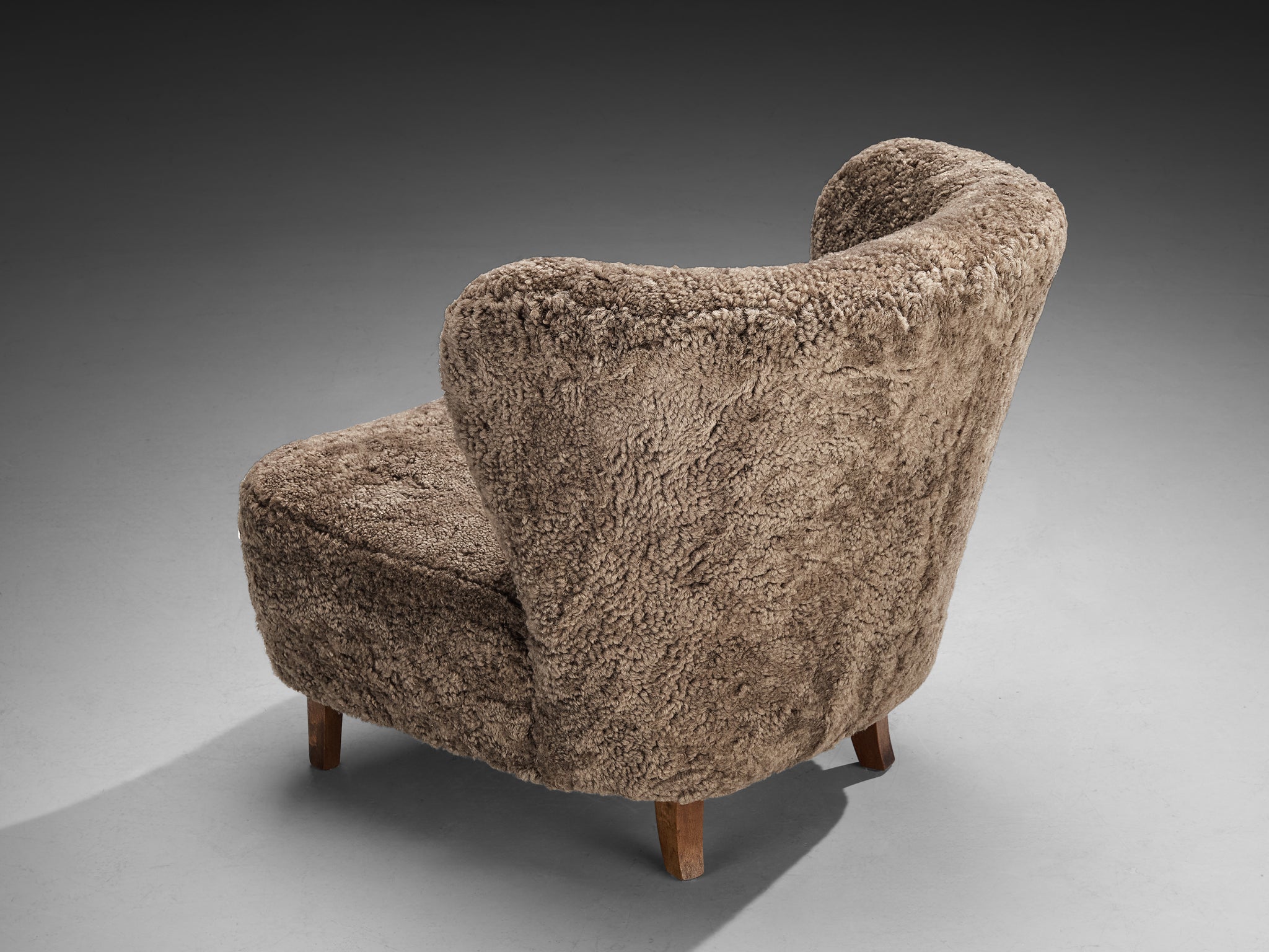 Gösta Jonsson Lounge Chair in Dark Grey Sheepskin Seating Morentz