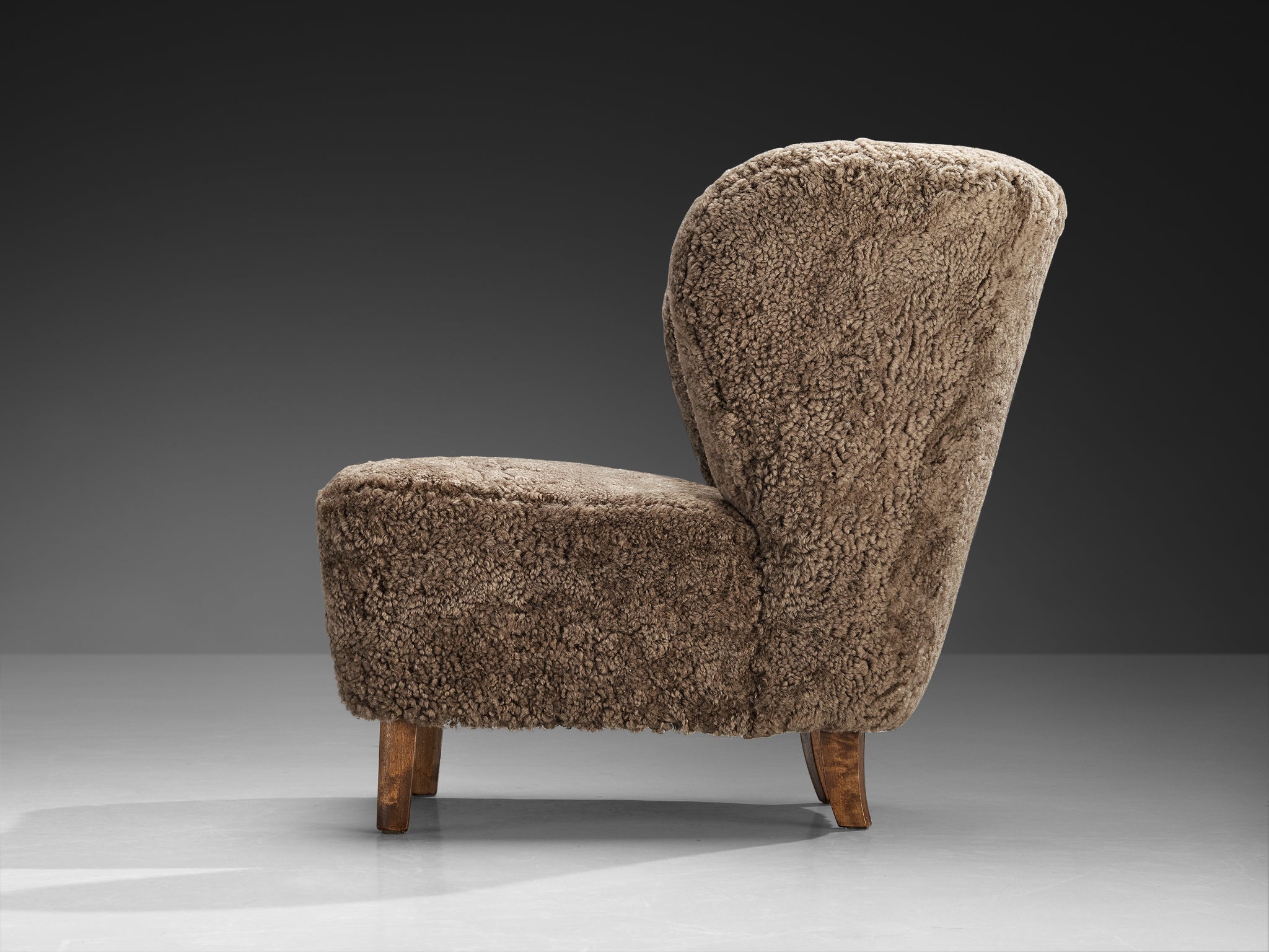 Gösta Jonsson Lounge Chair in Dark Grey Sheepskin Seating Morentz