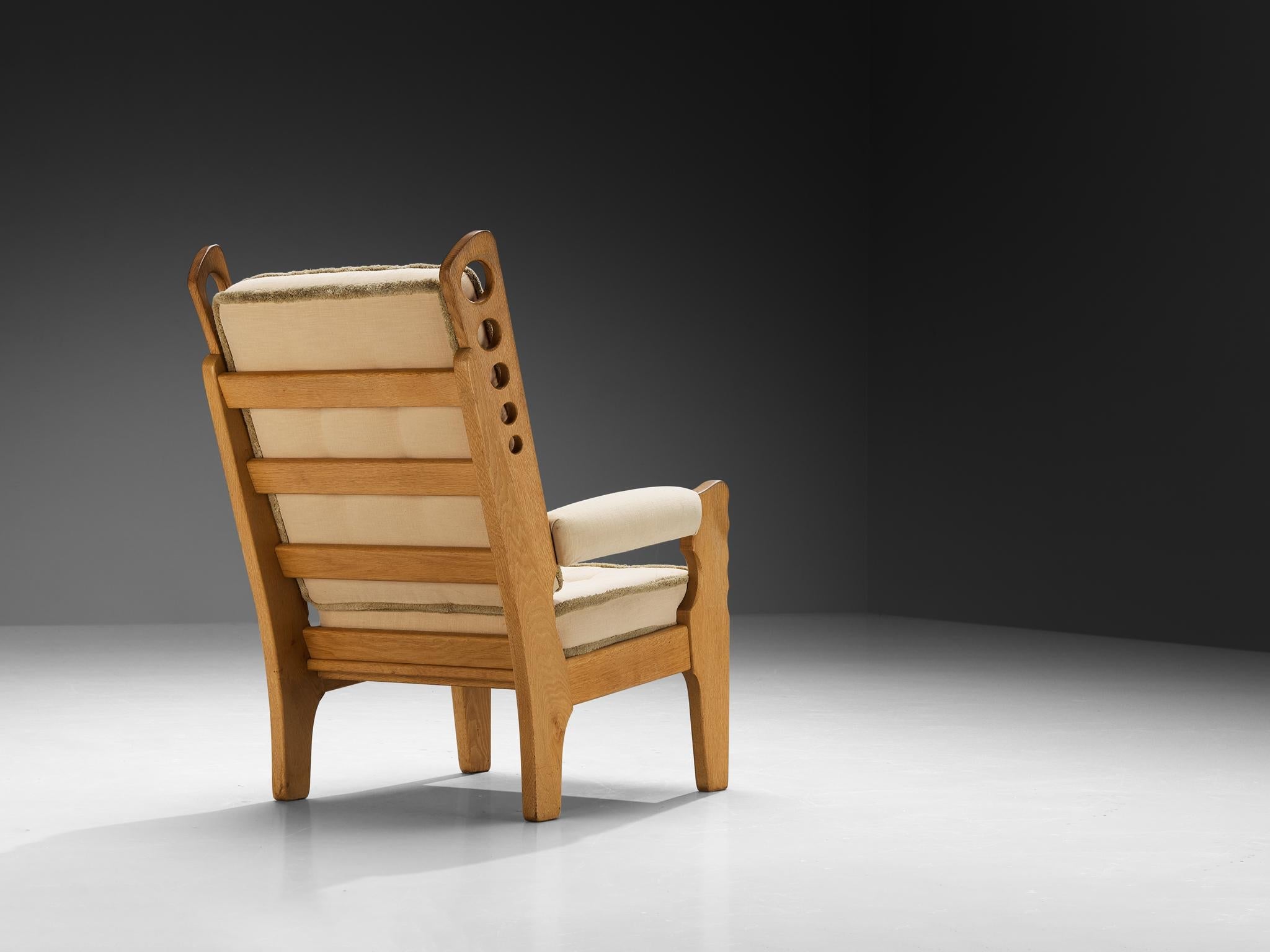 Eccentric Lounge Chair with Decorative Carvings in Oak and Beige Upholstery seating Morentz