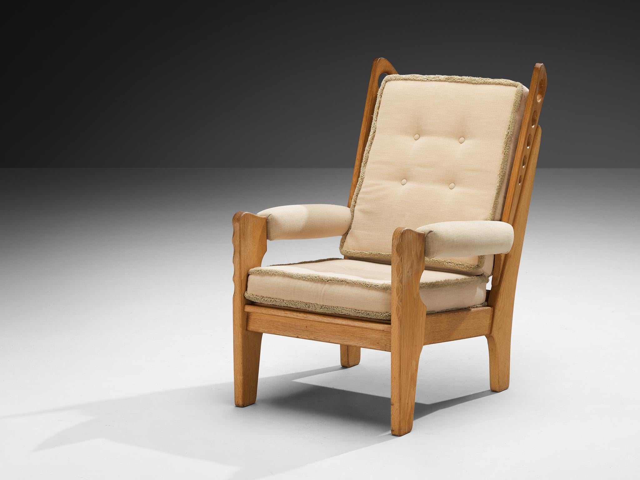 Eccentric Lounge Chair with Decorative Carvings in Oak and Beige Upholstery seating Morentz