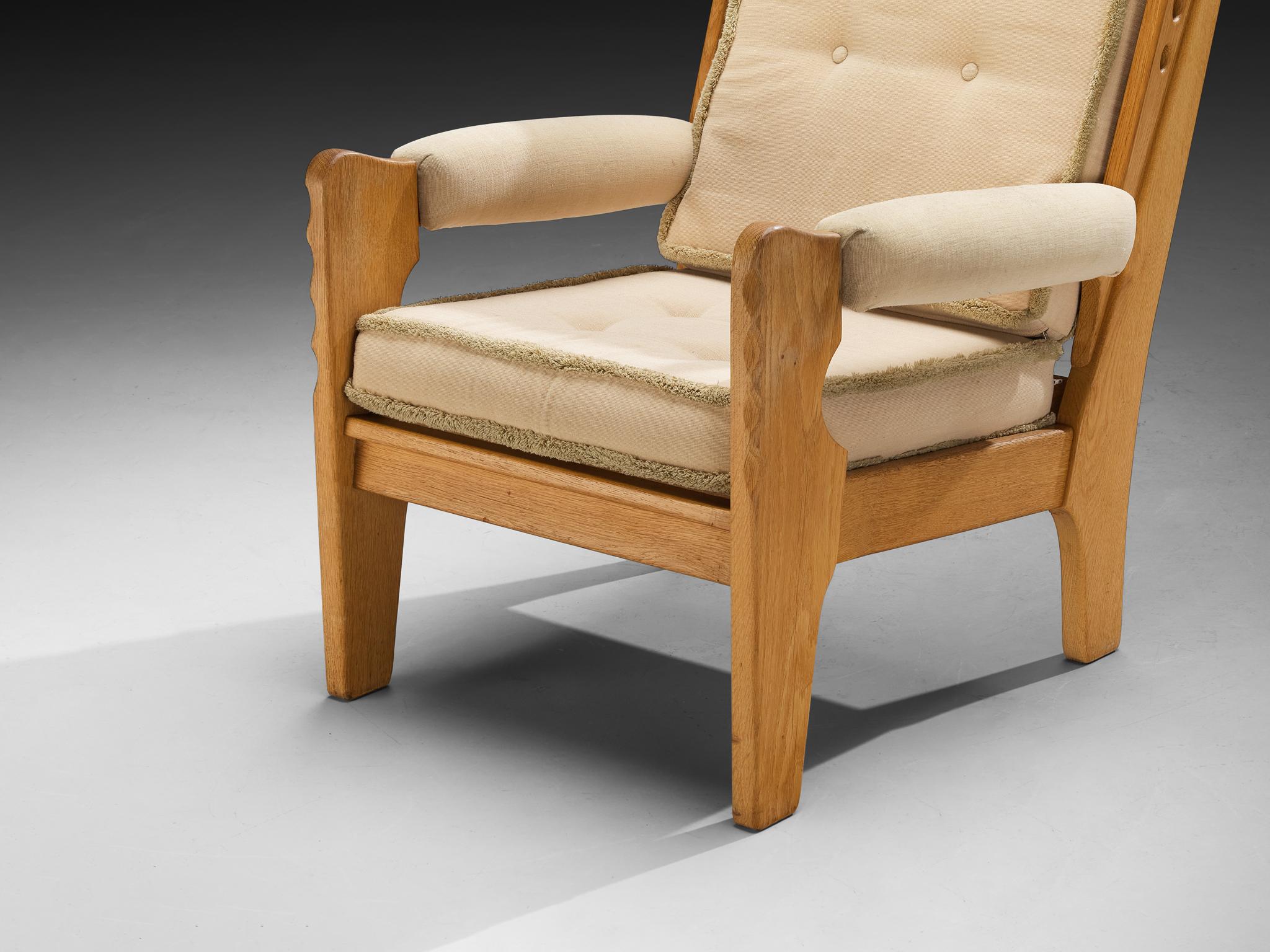 Eccentric Lounge Chair with Decorative Carvings in Oak and Beige Upholstery seating Morentz