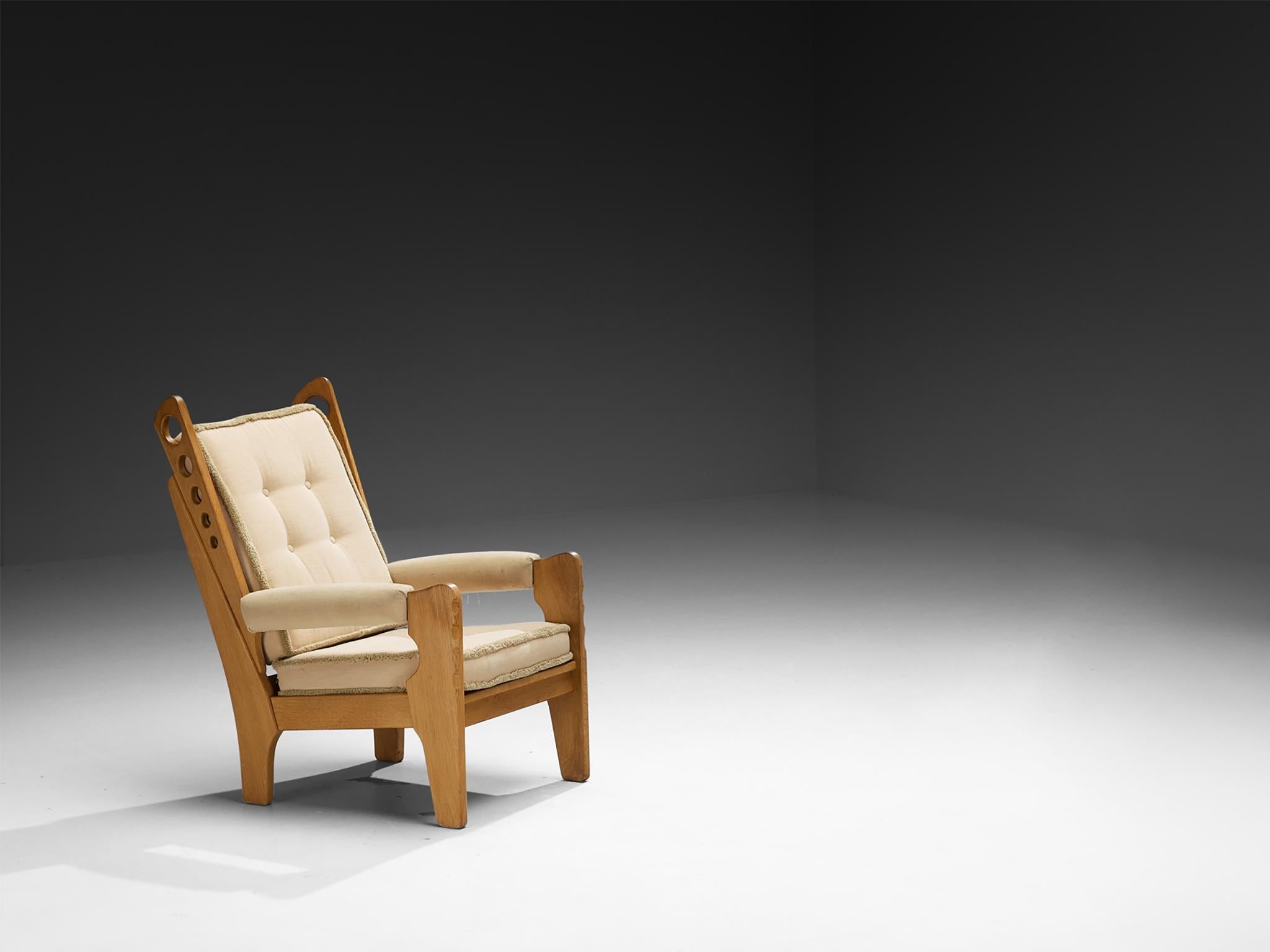 Eccentric Lounge Chair with Decorative Carvings in Oak and Beige Upholstery seating Morentz