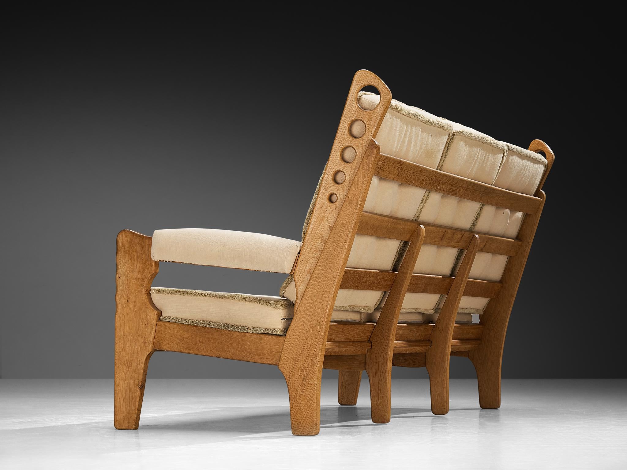 Eccentric Sofa with Geometric Carvings in Solid Oak and Light Beige Fabric seating Morentz