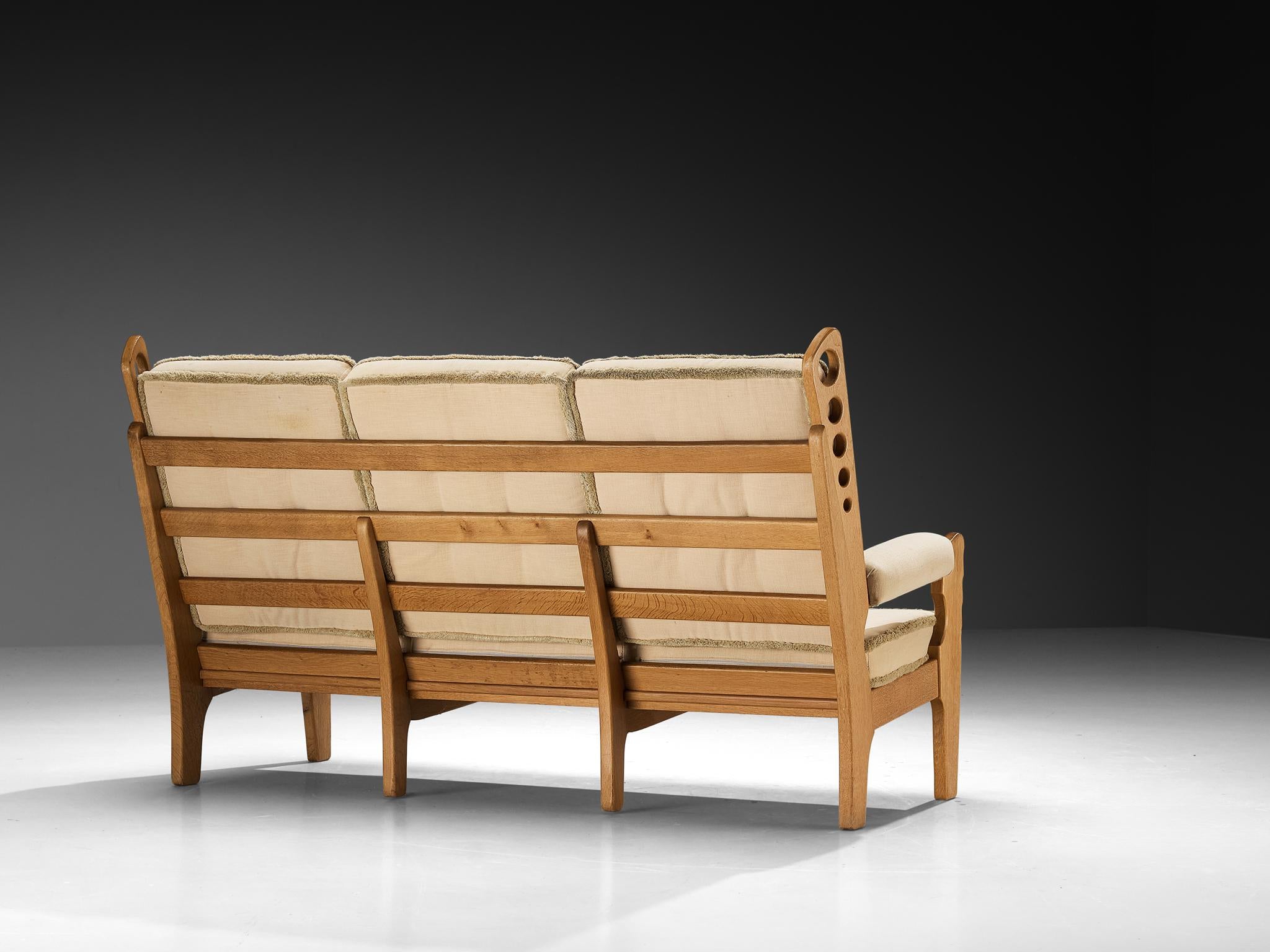 Eccentric Sofa with Geometric Carvings in Solid Oak and Light Beige Fabric seating Morentz