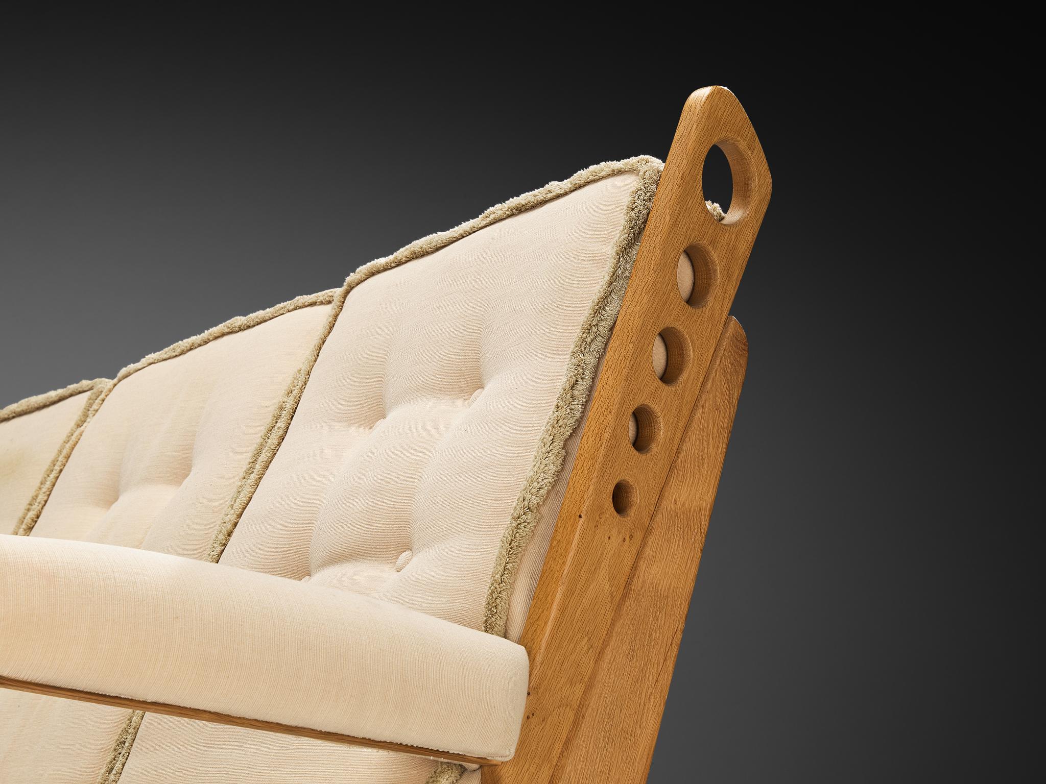 Eccentric Sofa with Geometric Carvings in Solid Oak and Light Beige Fabric seating Morentz