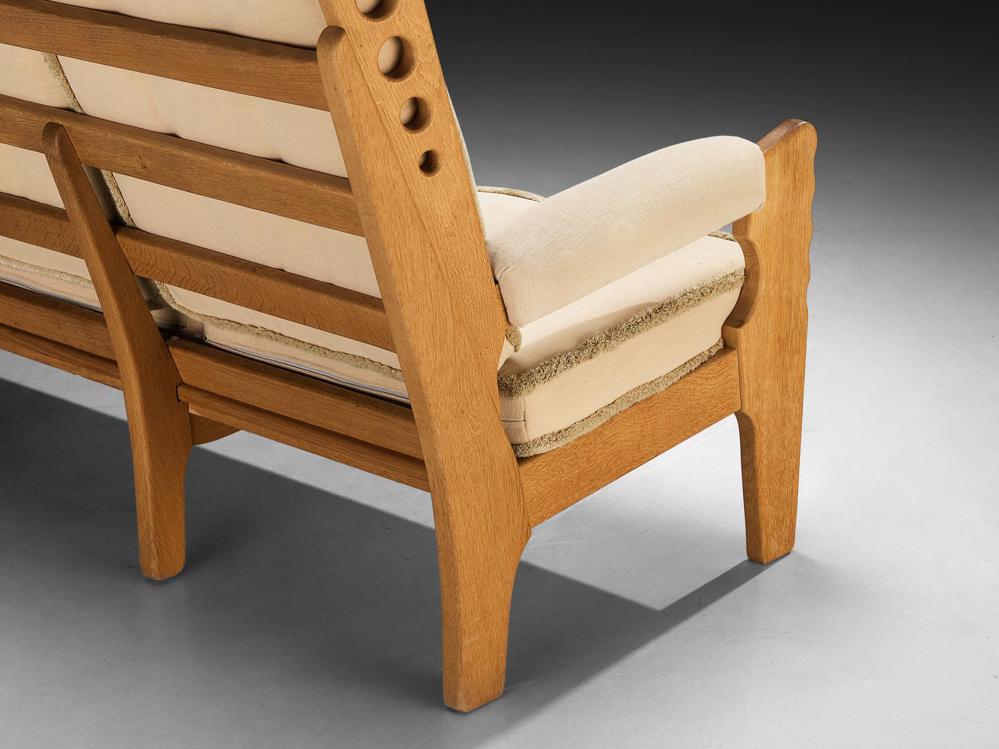 Eccentric Sofa with Geometric Carvings in Solid Oak and Light Beige Fabric seating Morentz