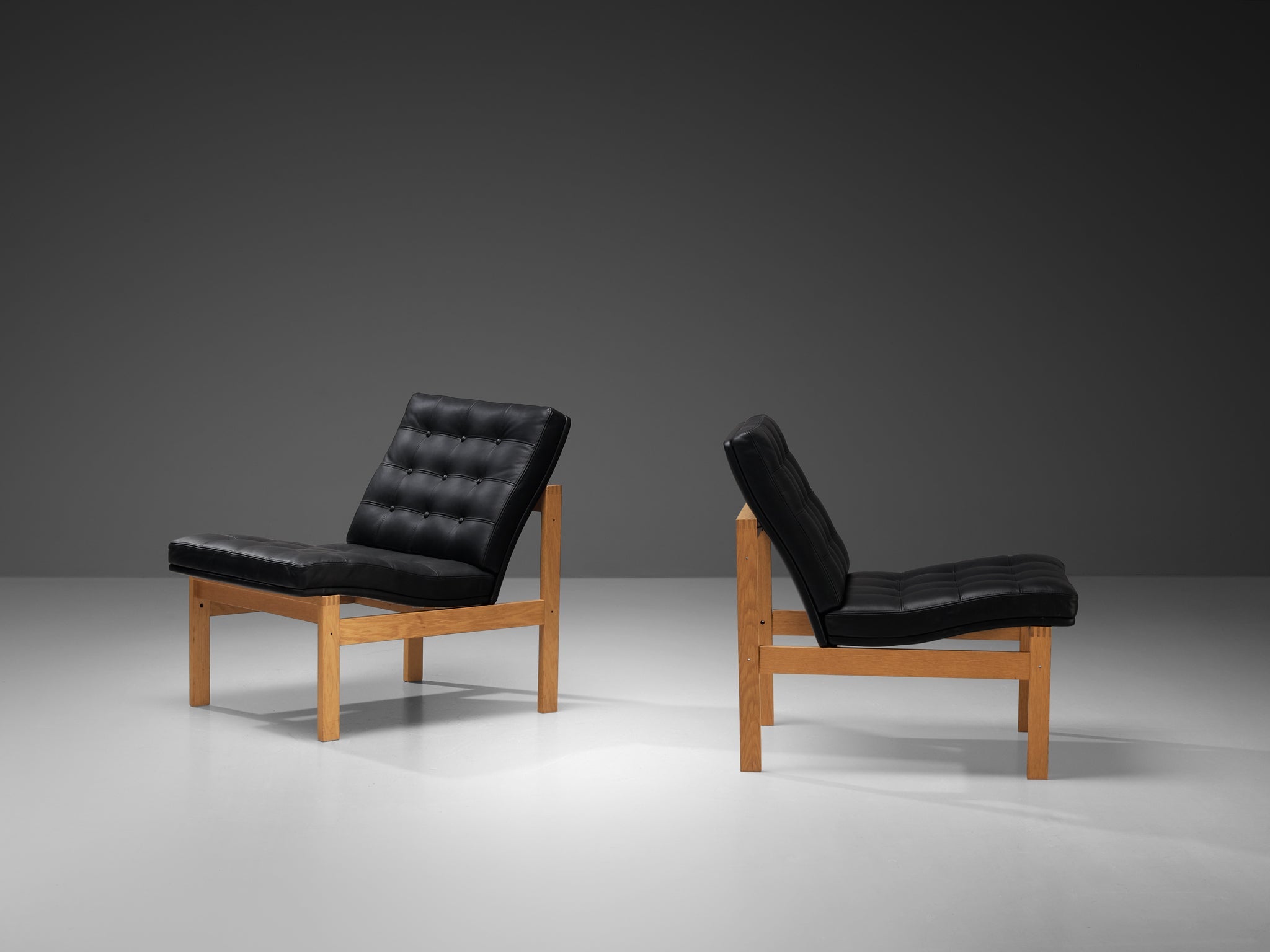 Torben Lind & Ole Gjerløv-Knudsen Pair of Easy Chairs Oak and Leather seating Morentz