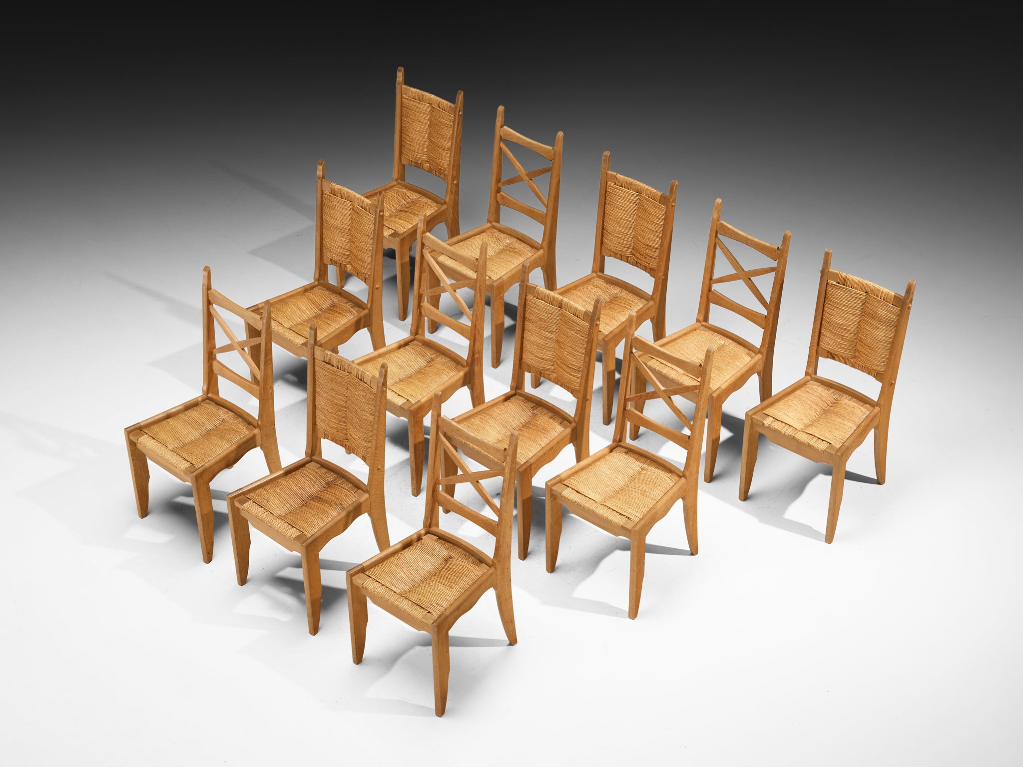 Guillerme & Chambron Set of Twelve Dining Chairs in Oak and Straw Seating Morentz