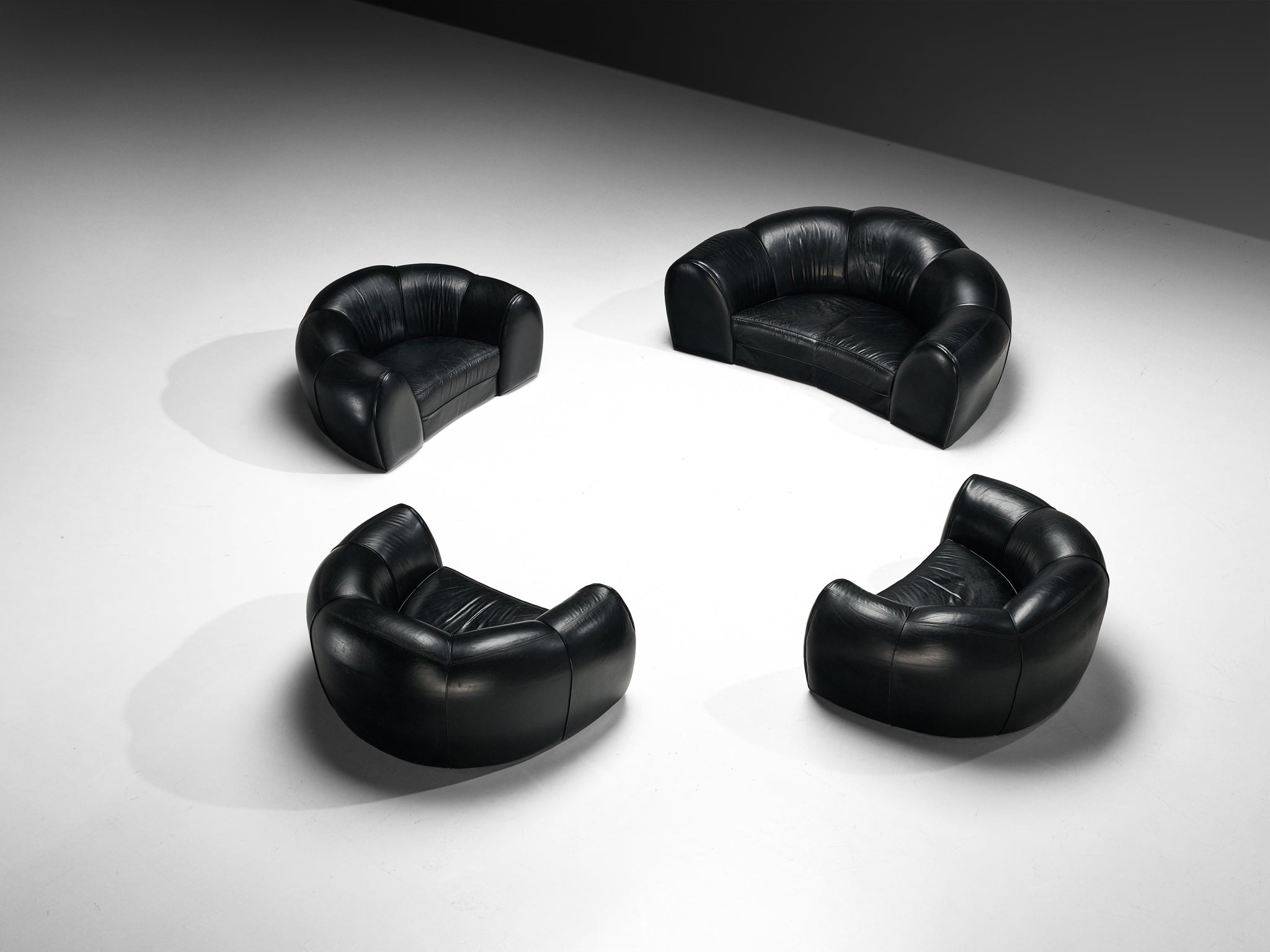 French Bulbous Croissant Shaped Sofa and Lounge Chairs in Black Leather seating Morentz