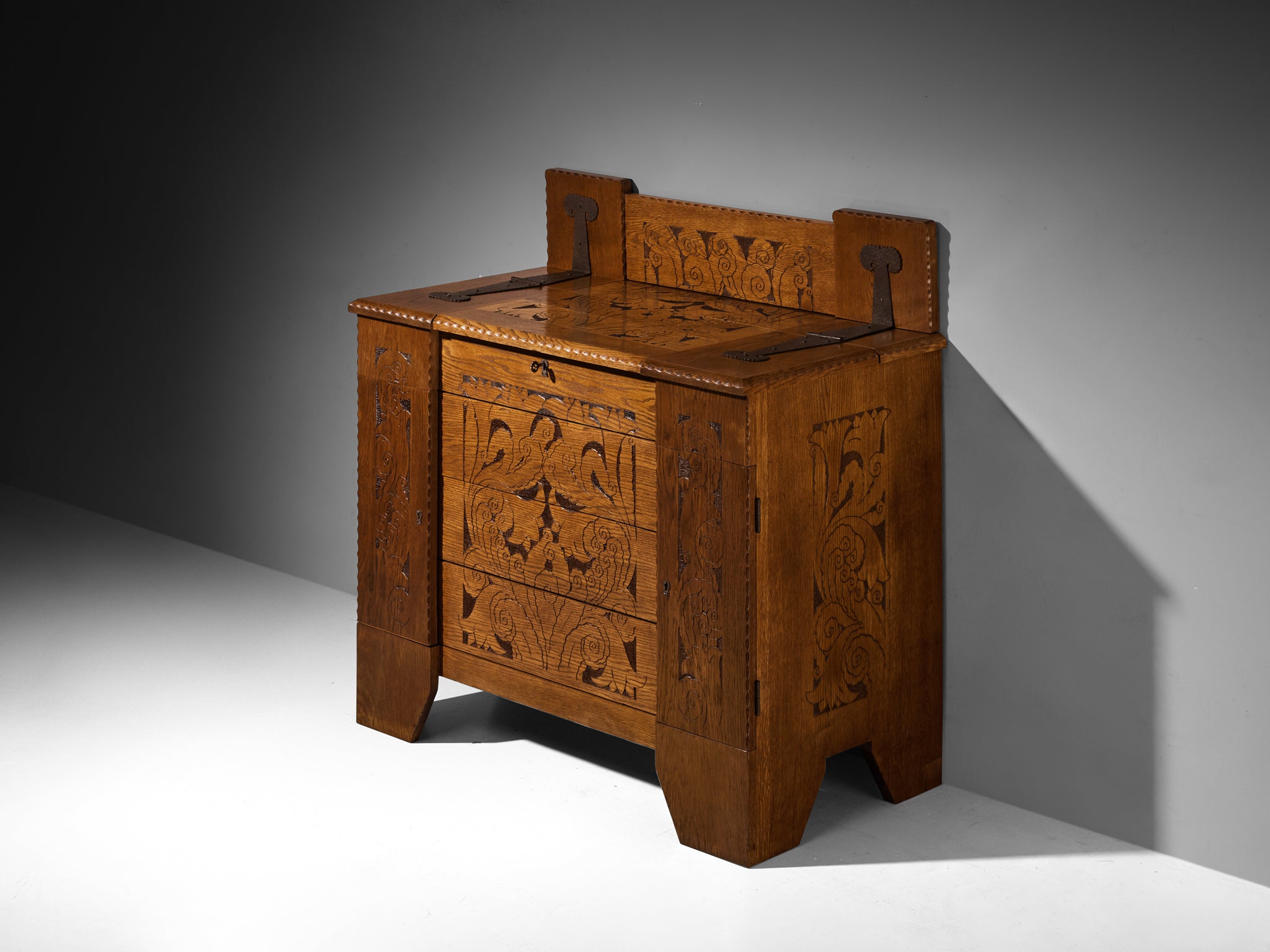 Gino Maggioni for Atelier di Varedo 1920s Chest of Drawers in Carved Oak Case pieces and storage cabinets Morentz