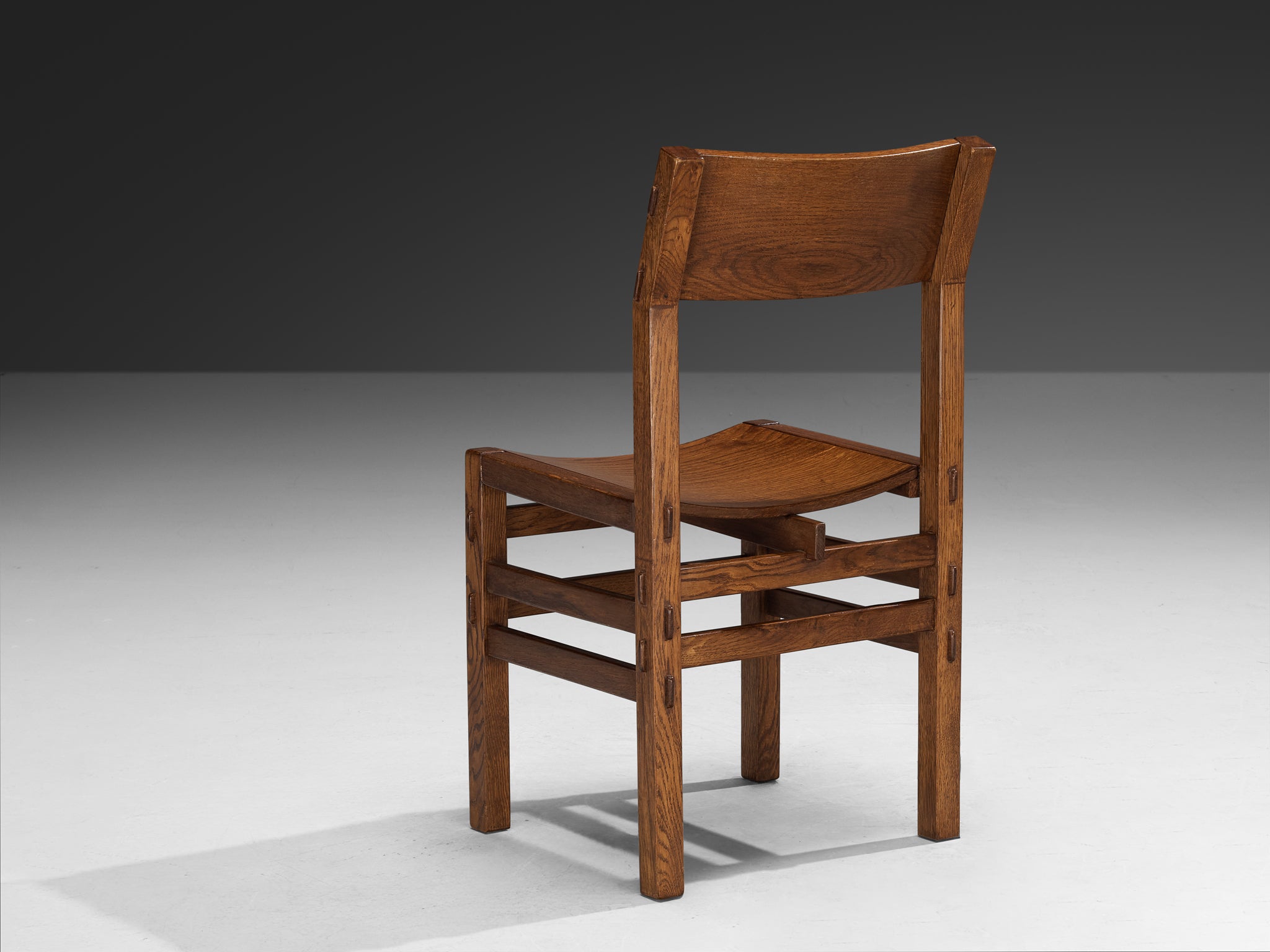 Giuseppe Rivadossi for Officina Rivadossi Dining Chairs with Carvings in Oak Seating Morentz