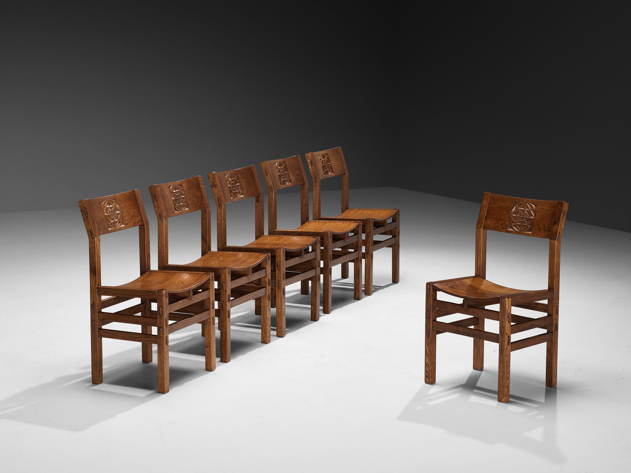 Giuseppe Rivadossi for Officina Rivadossi Dining Chairs with Carvings in Oak Seating Morentz