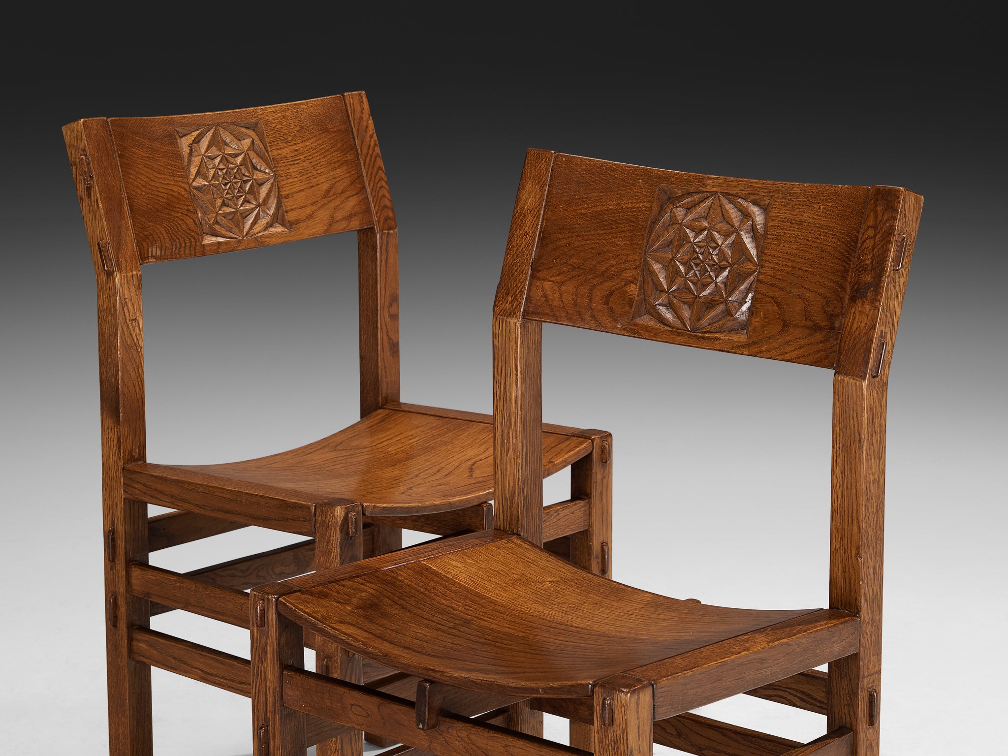 Giuseppe Rivadossi for Officina Rivadossi Dining Chairs with Carvings in Oak Seating Morentz