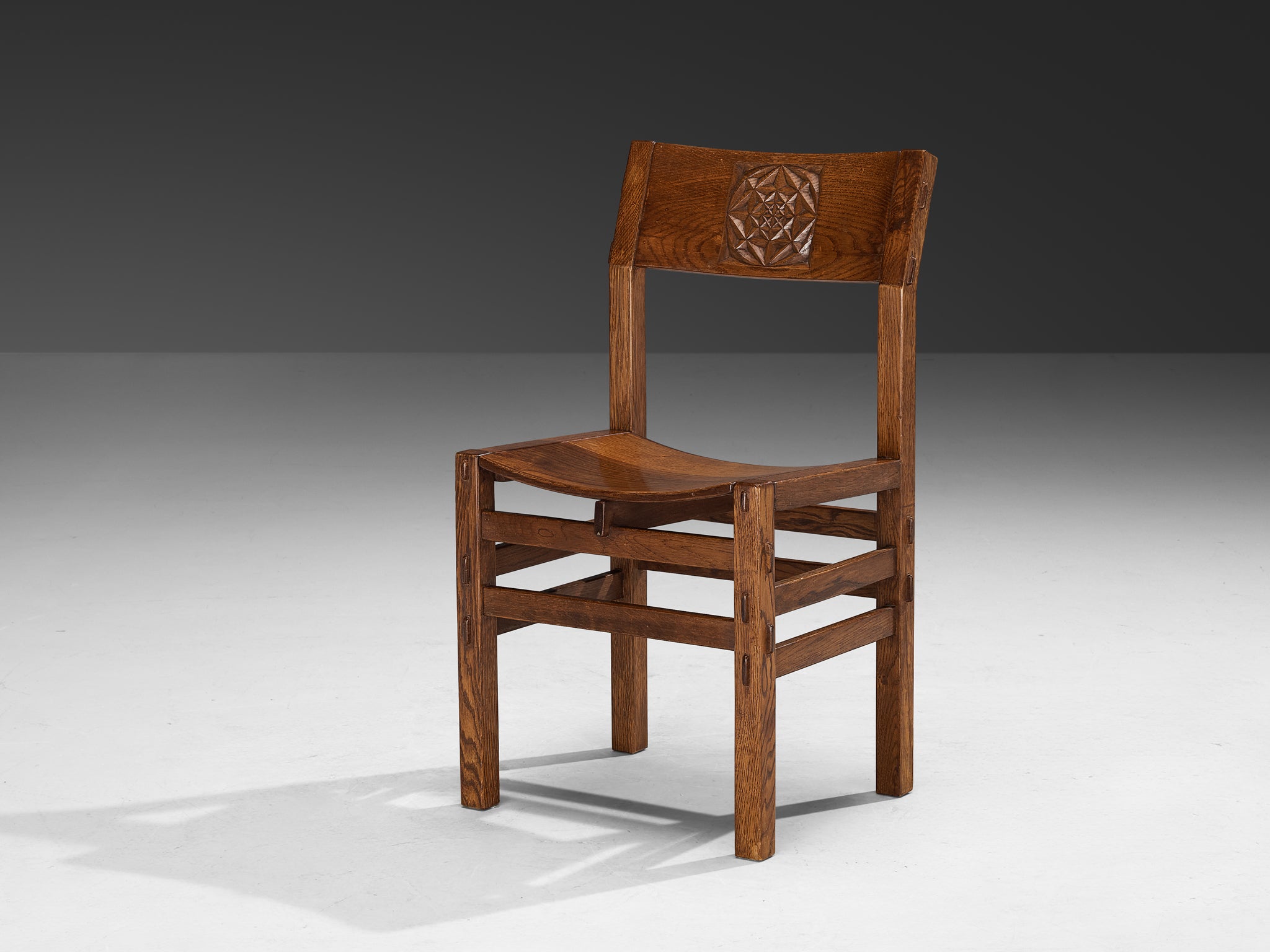 Giuseppe Rivadossi for Officina Rivadossi Dining Chairs with Carvings in Oak Seating Morentz