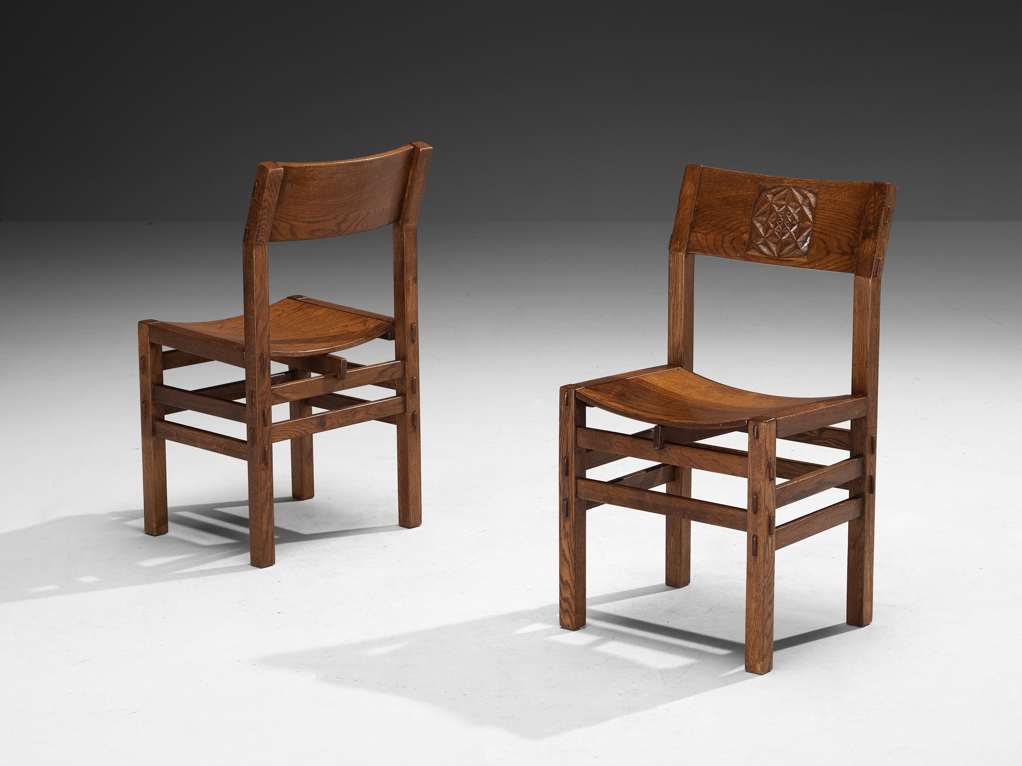 Giuseppe Rivadossi for Officina Rivadossi Dining Chairs with Carvings in Oak Seating Morentz