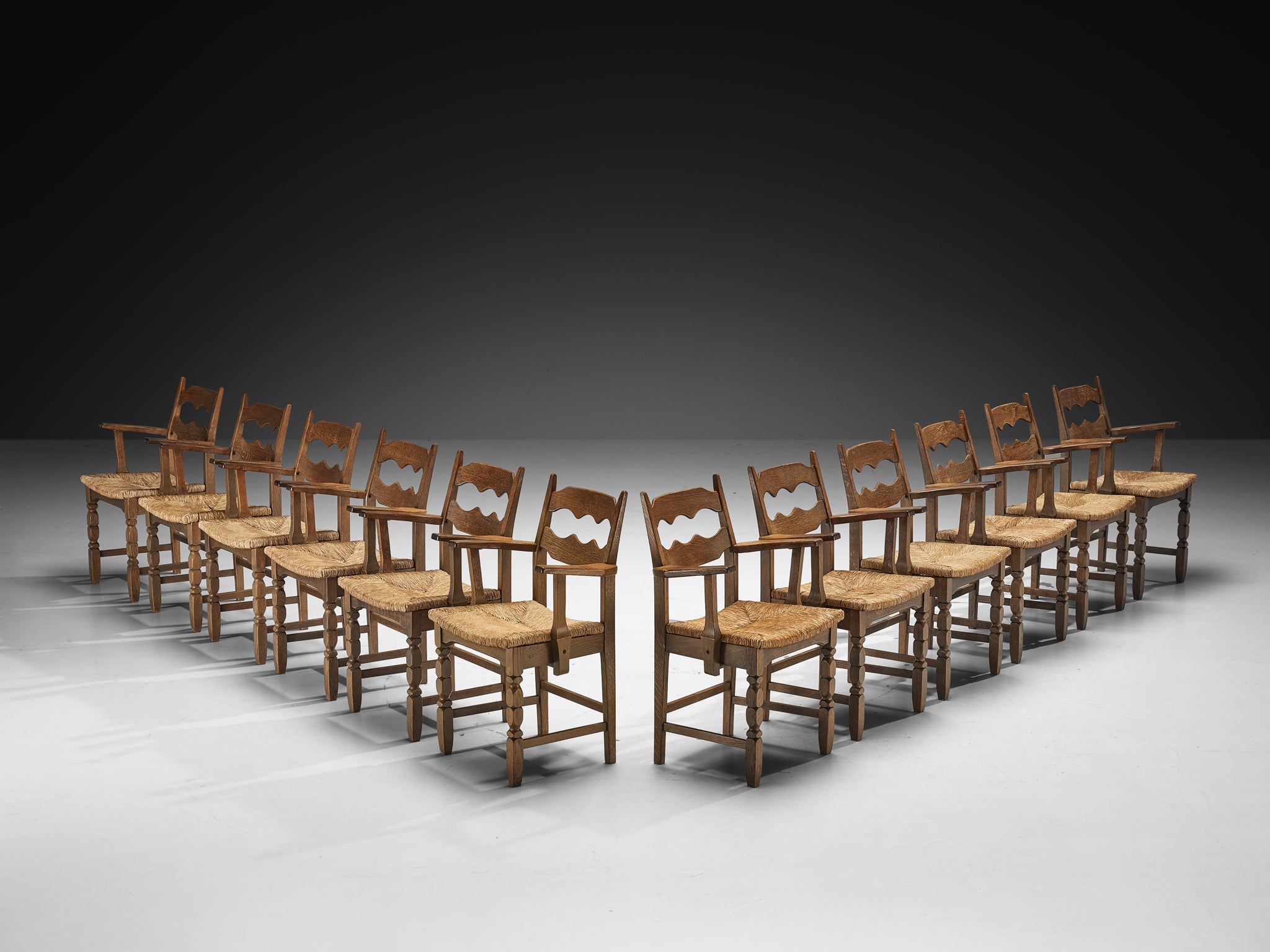 Set of Twelve Rustic Mid-Century Carved Armchairs in Oak and Straw Seating Morentz