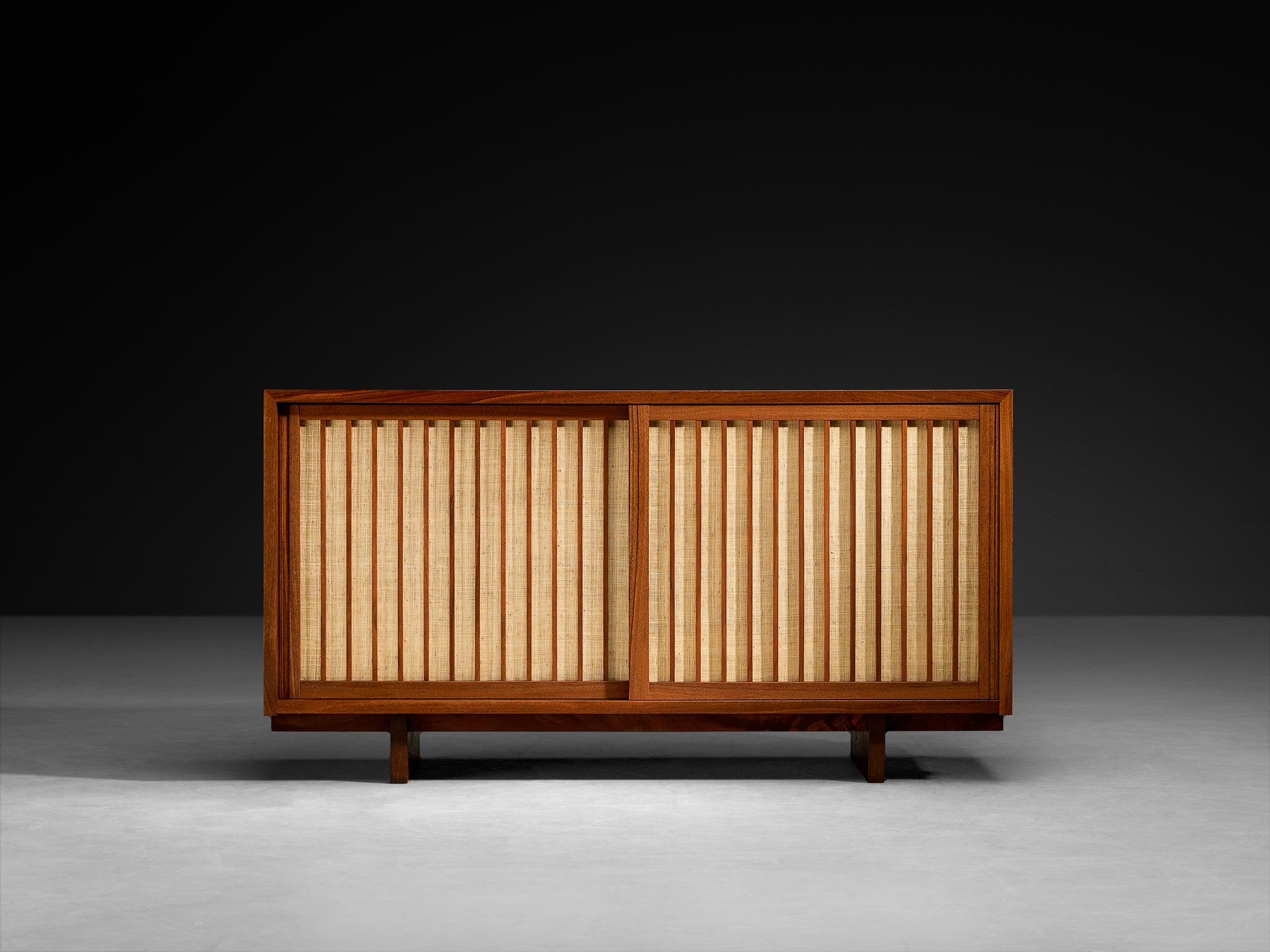 George Nakashima Double Sliding-Door Cabinet in Walnut and Pandanus Cloth