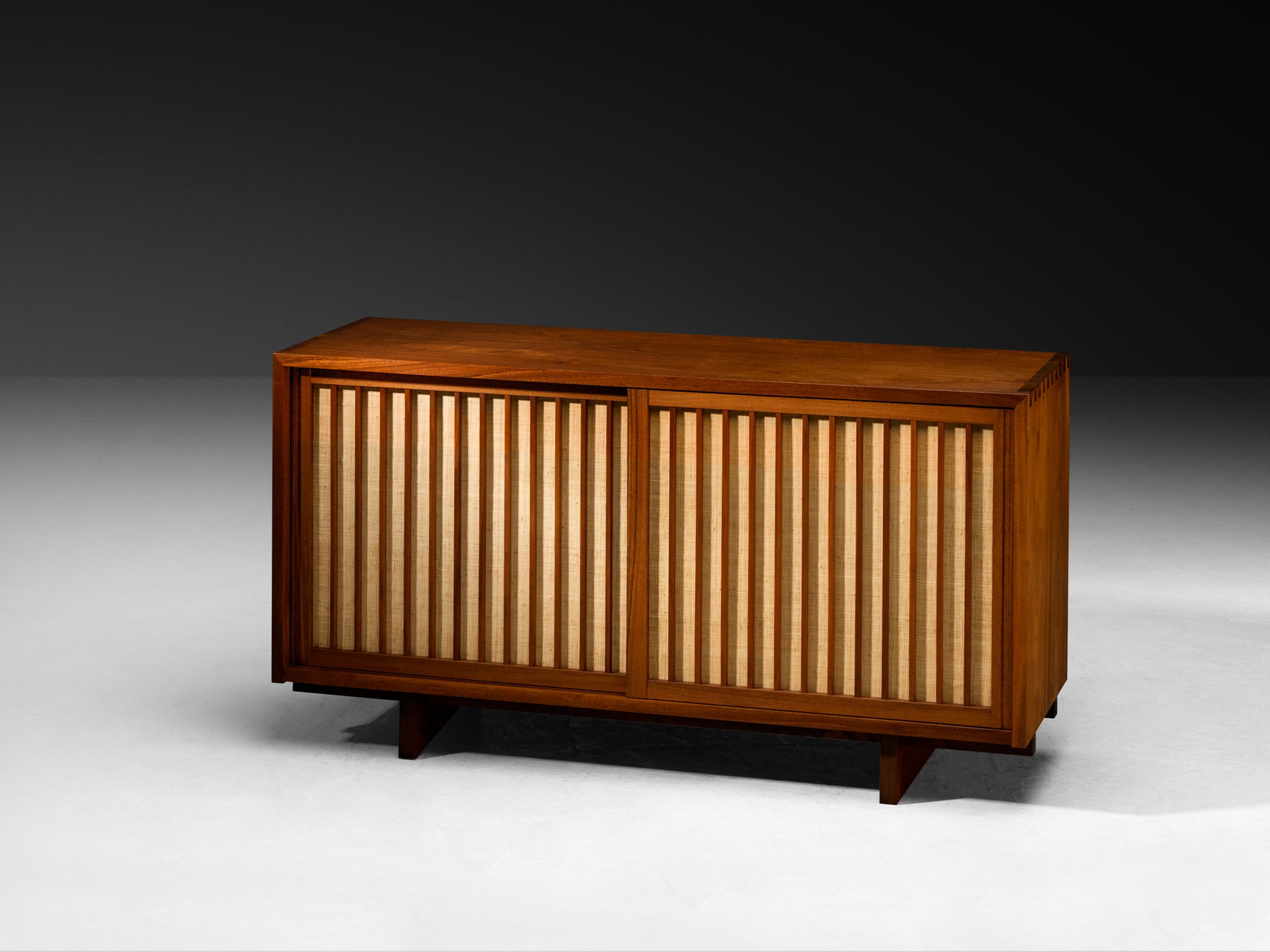 George Nakashima Double Sliding-Door Cabinet in Walnut and Pandanus Cloth