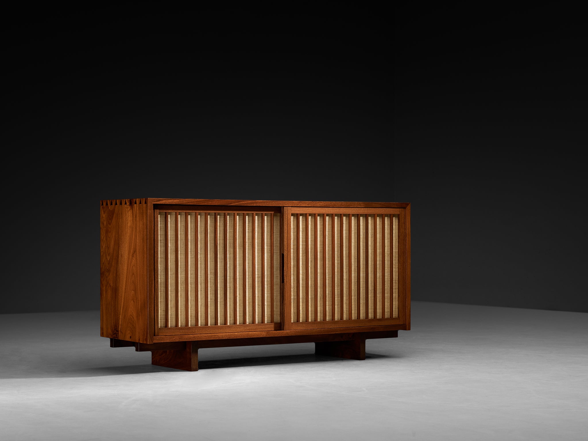 George Nakashima Double Sliding-Door Cabinet in Walnut and Pandanus Cloth