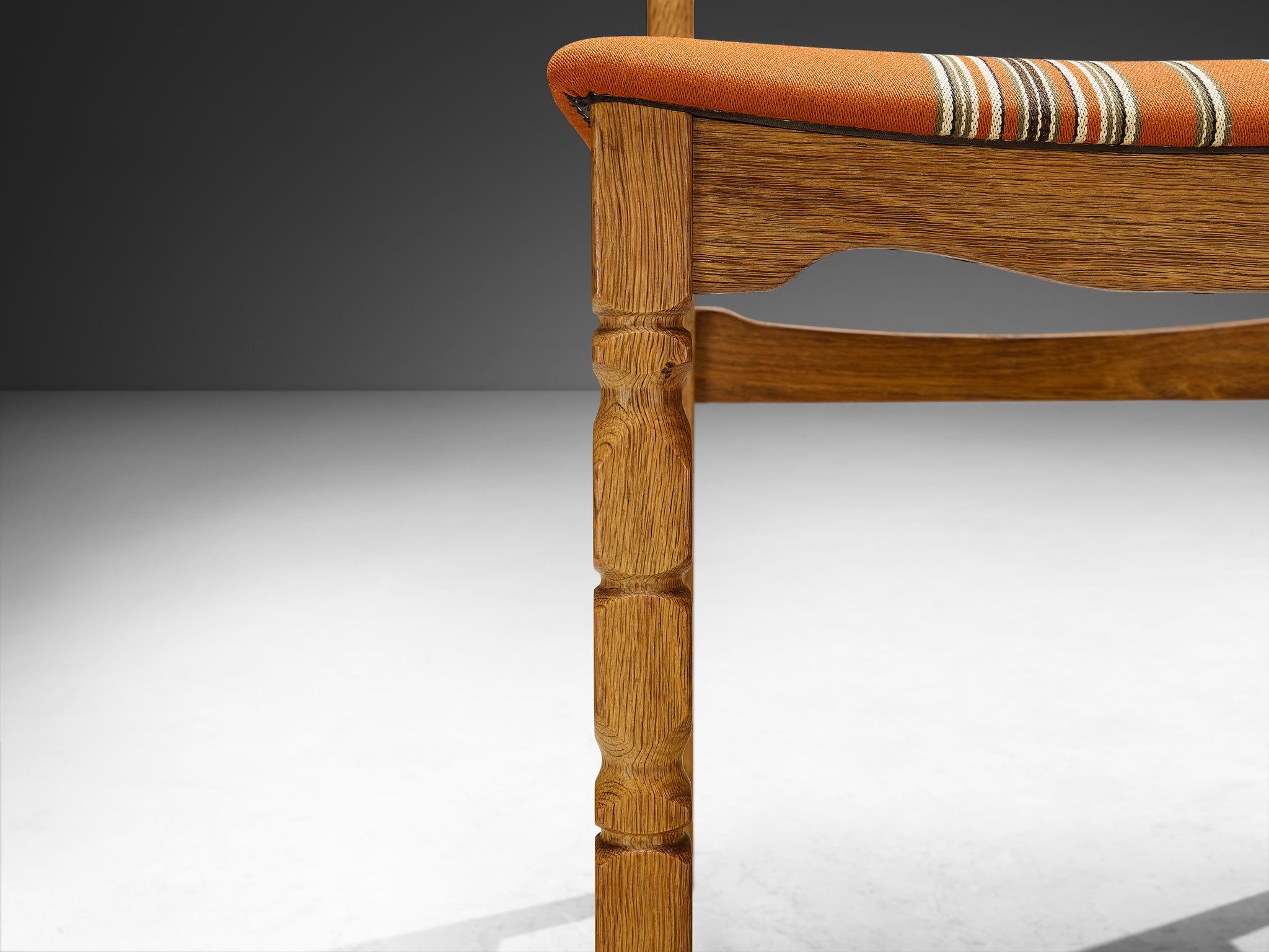 Henning Kjærnulf for Nyrup Møbelfabrik Set of Twelve Carved Dining Chairs in Solid Oak