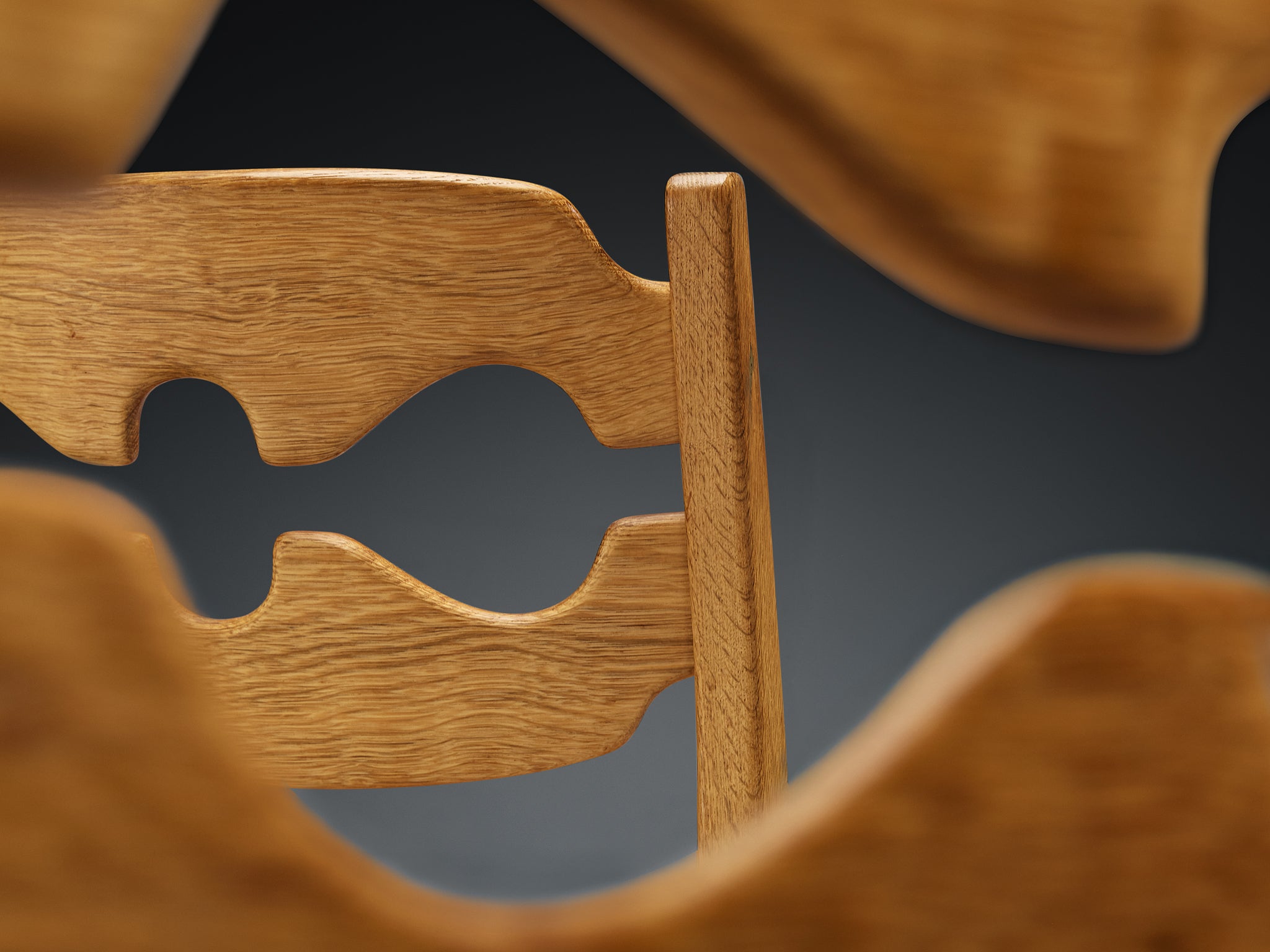 Henning Kjærnulf for Nyrup Møbelfabrik Set of Twelve Carved Dining Chairs in Solid Oak