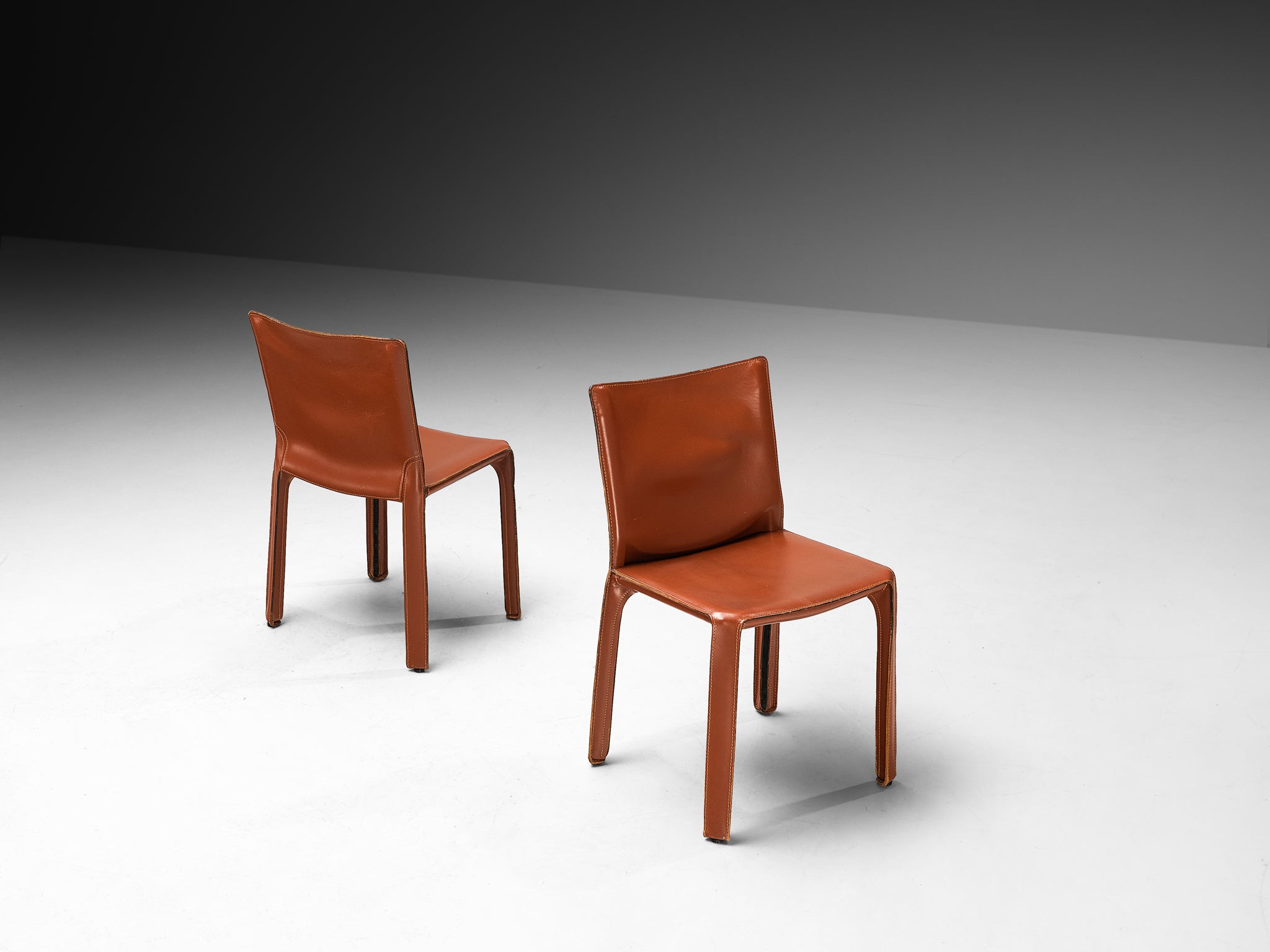 Mario Bellini for Cassina Set of Sixteen 'Cab' Dining Chairs in Red Brown Leather Seating Morentz