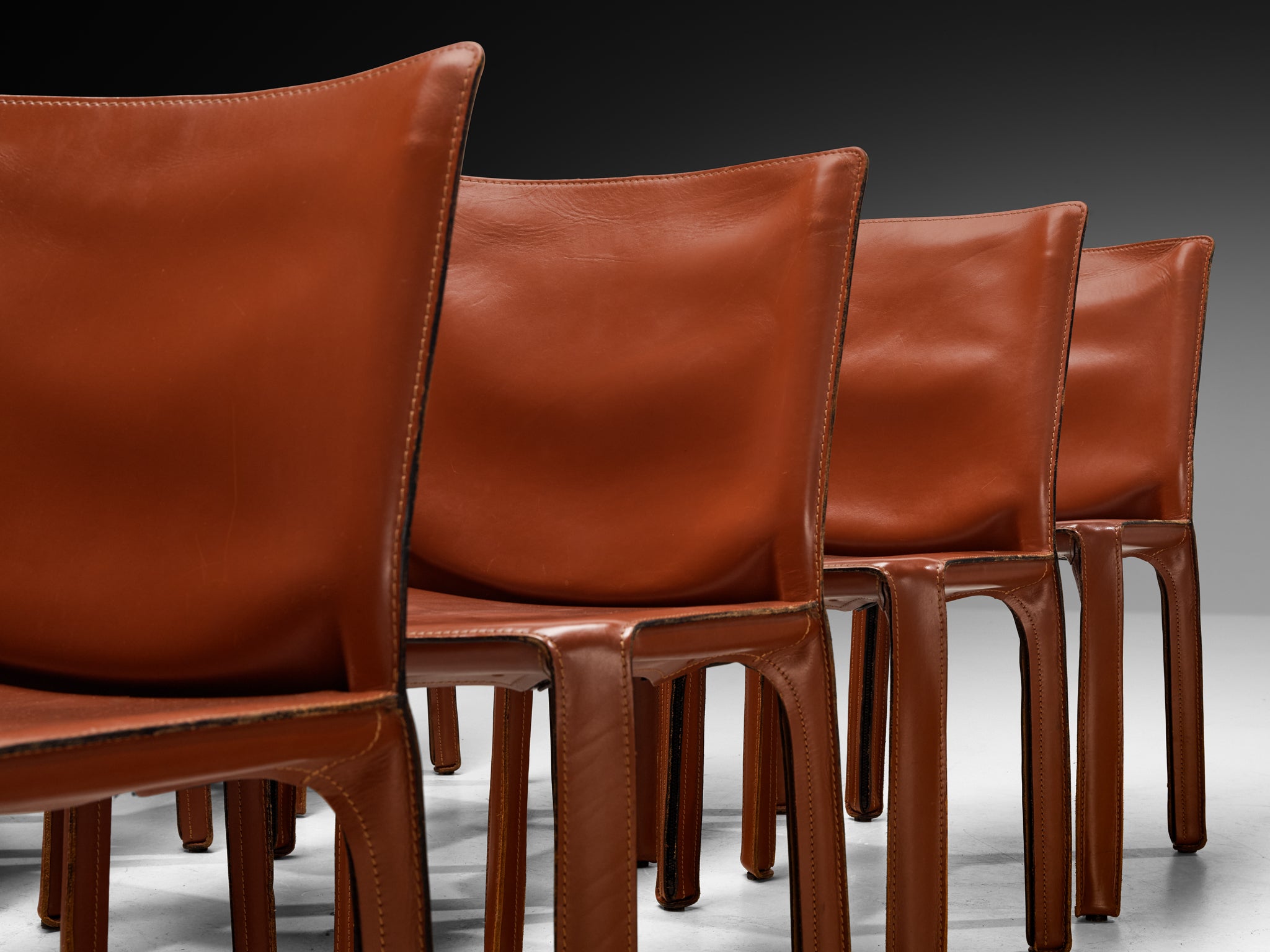 Mario Bellini for Cassina Set of Sixteen 'Cab' Dining Chairs in Red Brown Leather Seating Morentz
