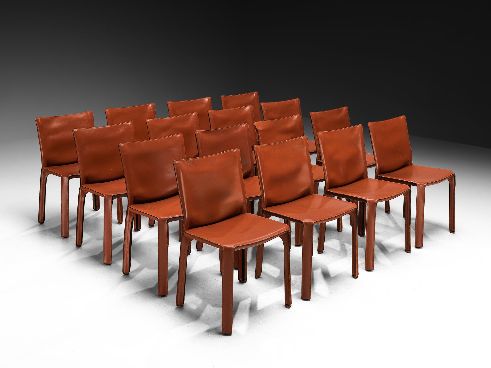 Mario Bellini for Cassina Set of Sixteen 'Cab' Dining Chairs in Red Brown Leather Seating Morentz