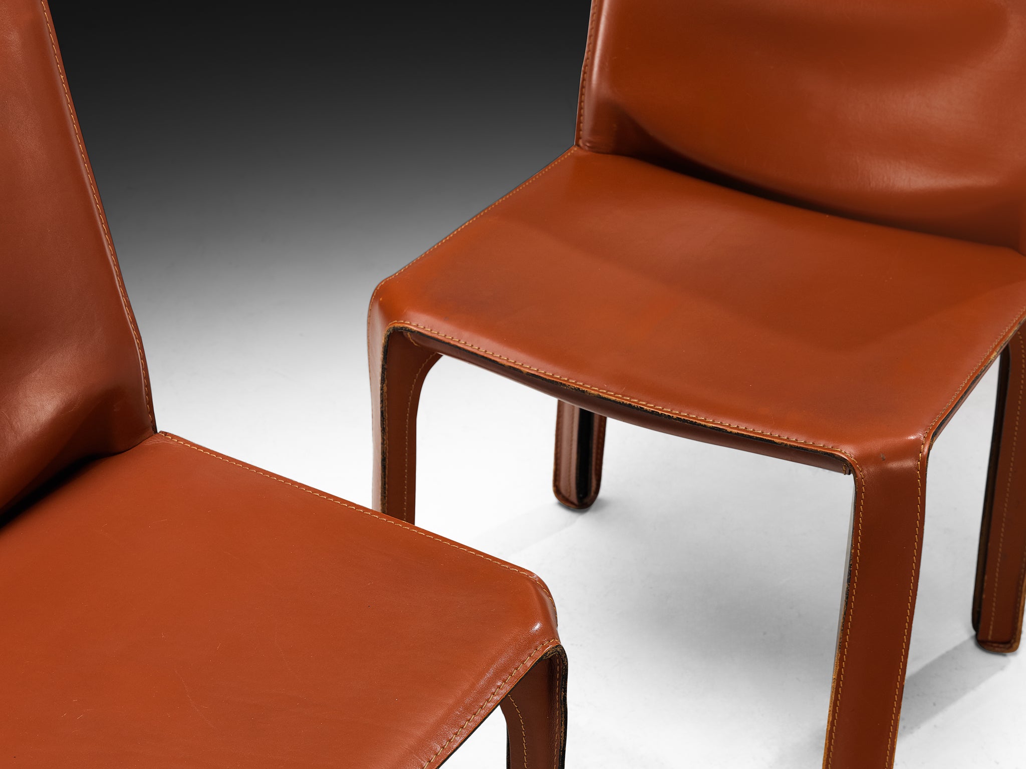 Mario Bellini for Cassina Set of Sixteen 'Cab' Dining Chairs in Red Brown Leather Seating Morentz